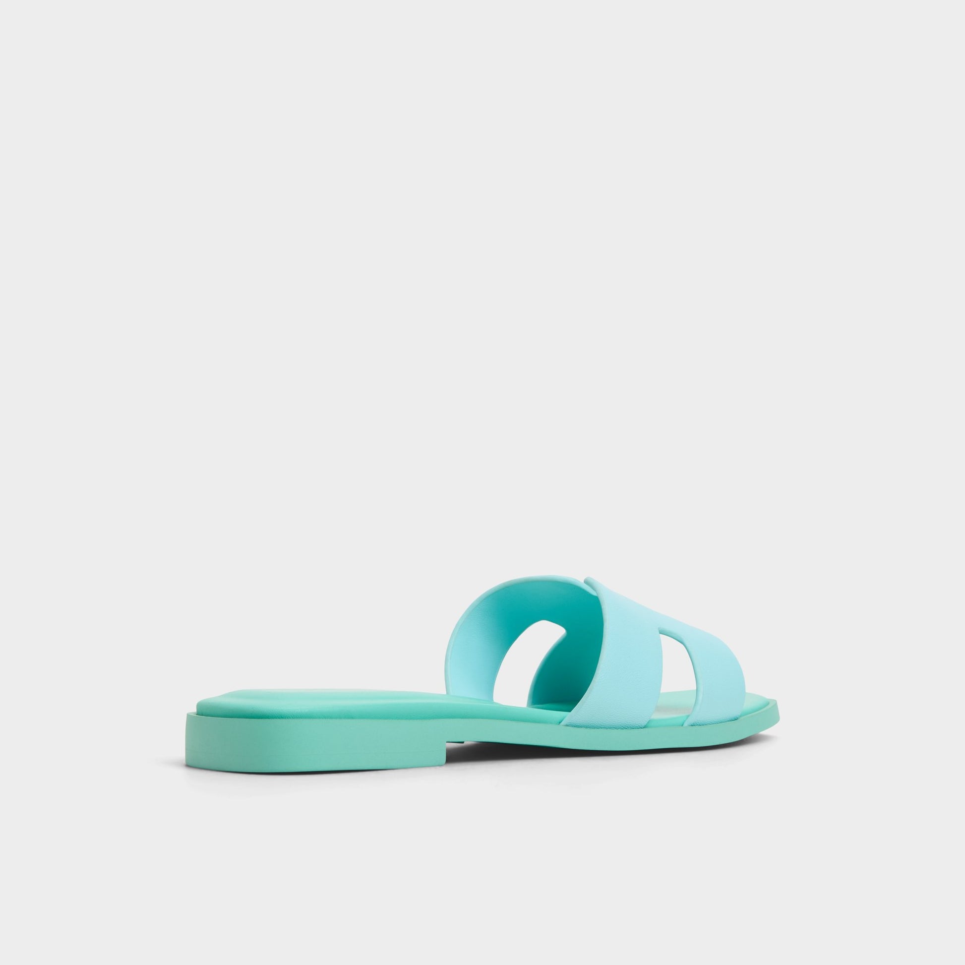 Three-quarter angle of Turquoise Itsandal Slide sandal's back side