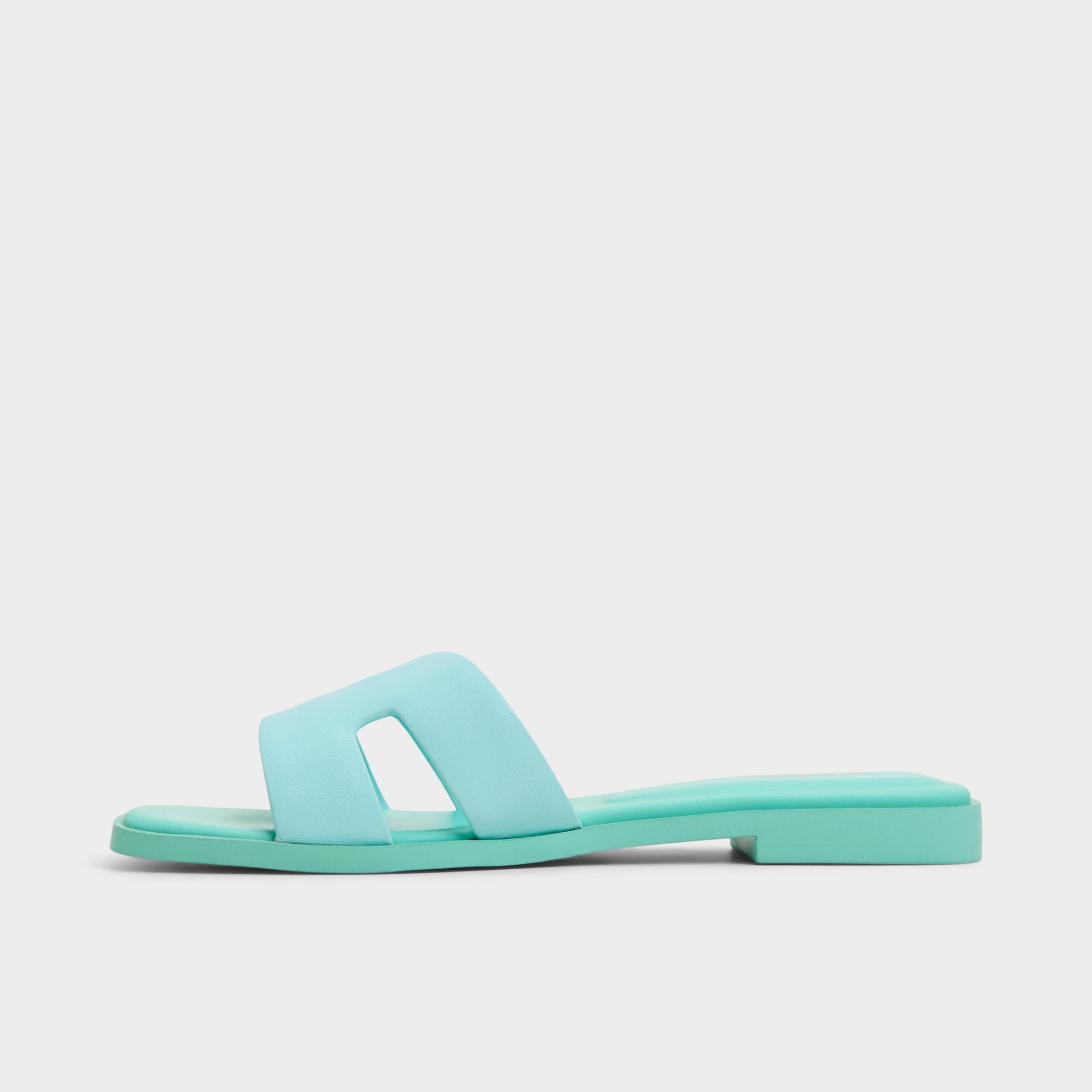 Side view of Turquoise Itsandal Slide sandal