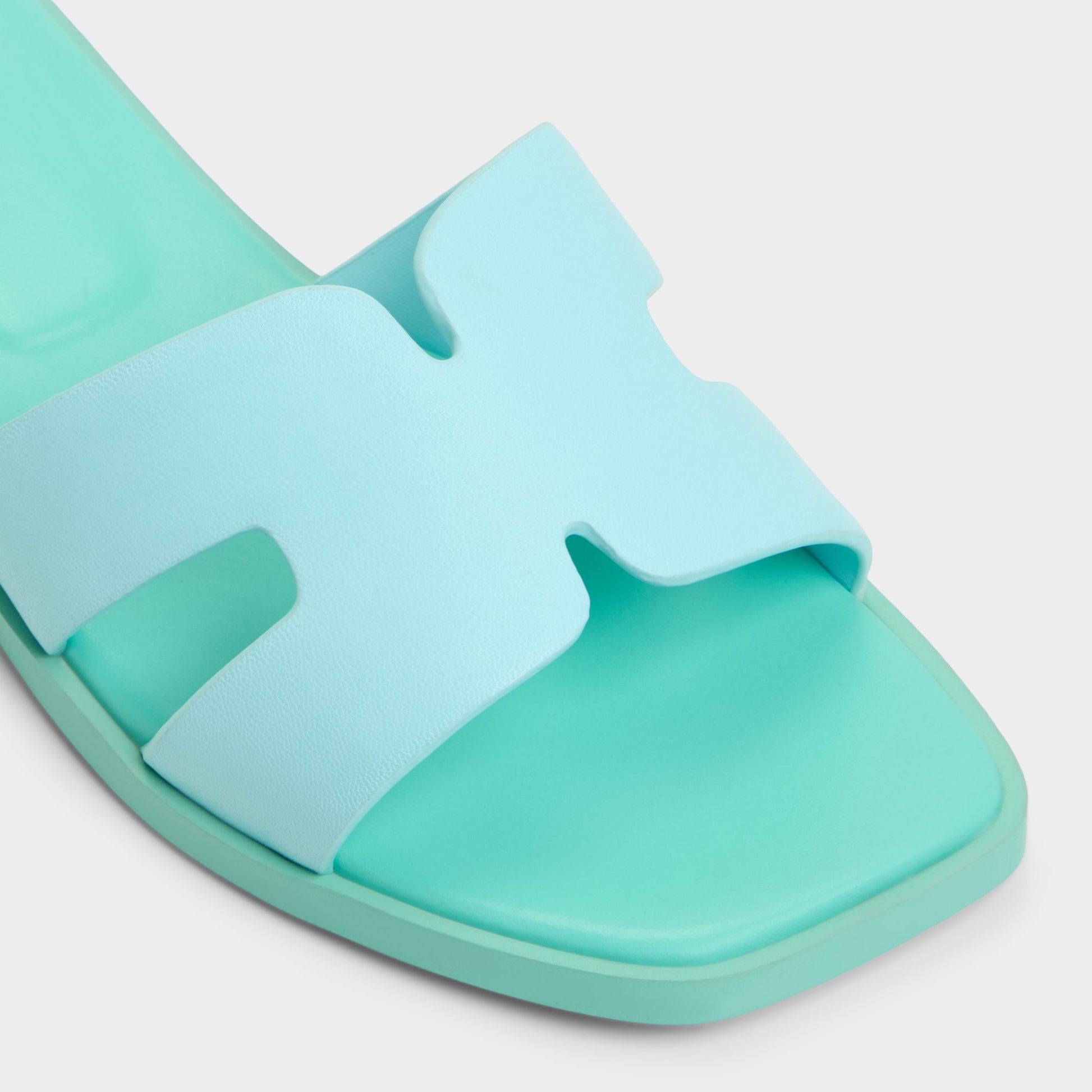 Close-up of the Turquoise Itsandal Slide sandal