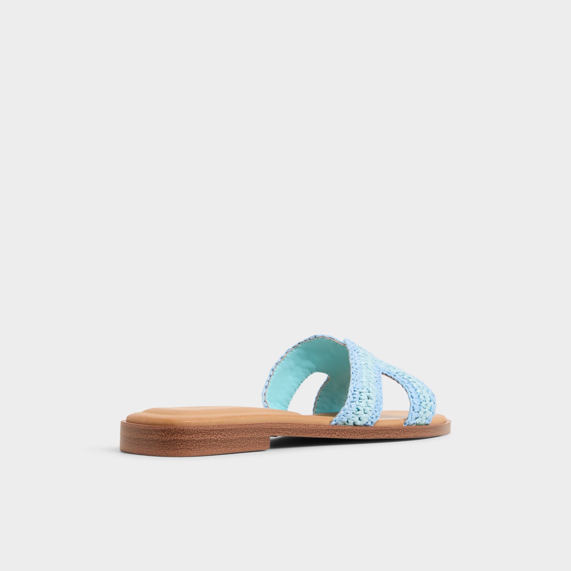 Three-quarter angle of Blue Combo Itsandal Slide sandal's back side