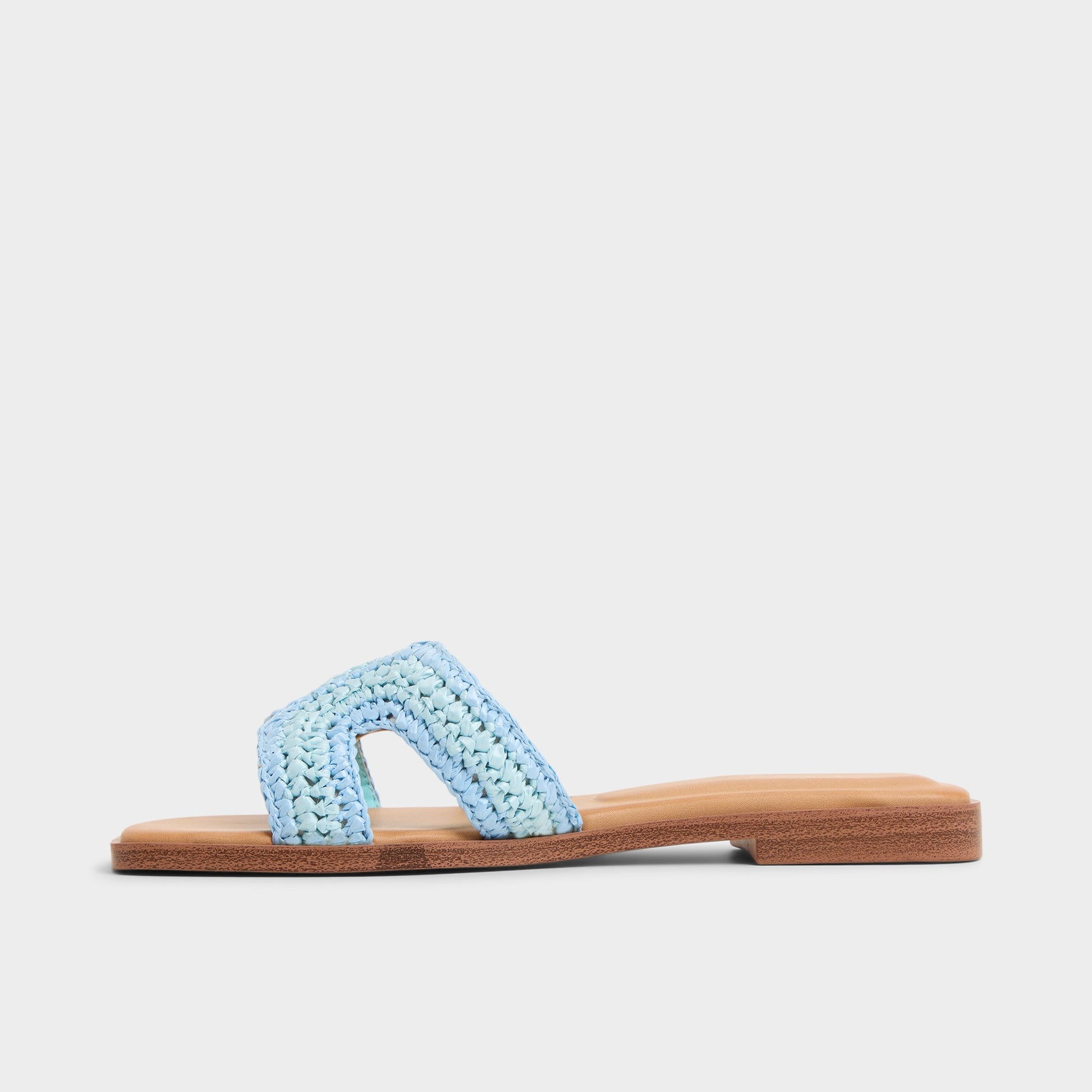 Side view of Blue Combo Itsandal Slide sandal