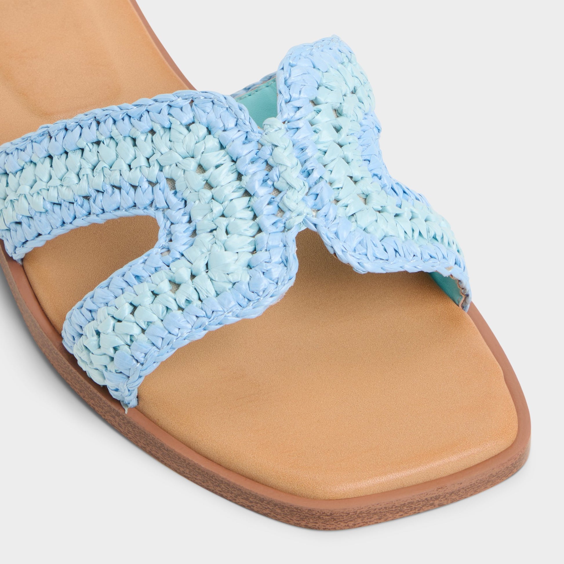 Close-up of the Blue Combo Itsandal Slide sandal