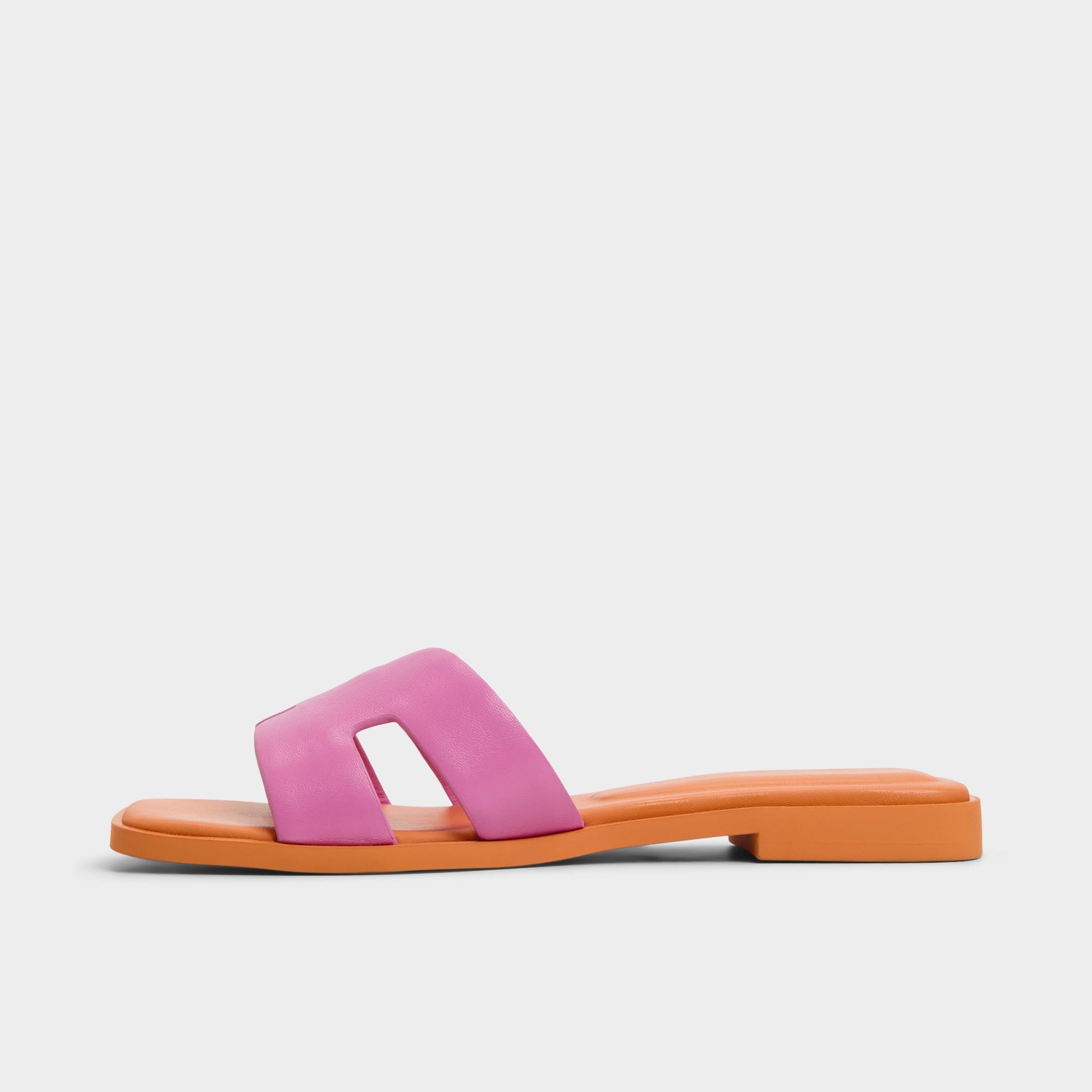 Side view of Bright Pink Itsandal Slide sandal