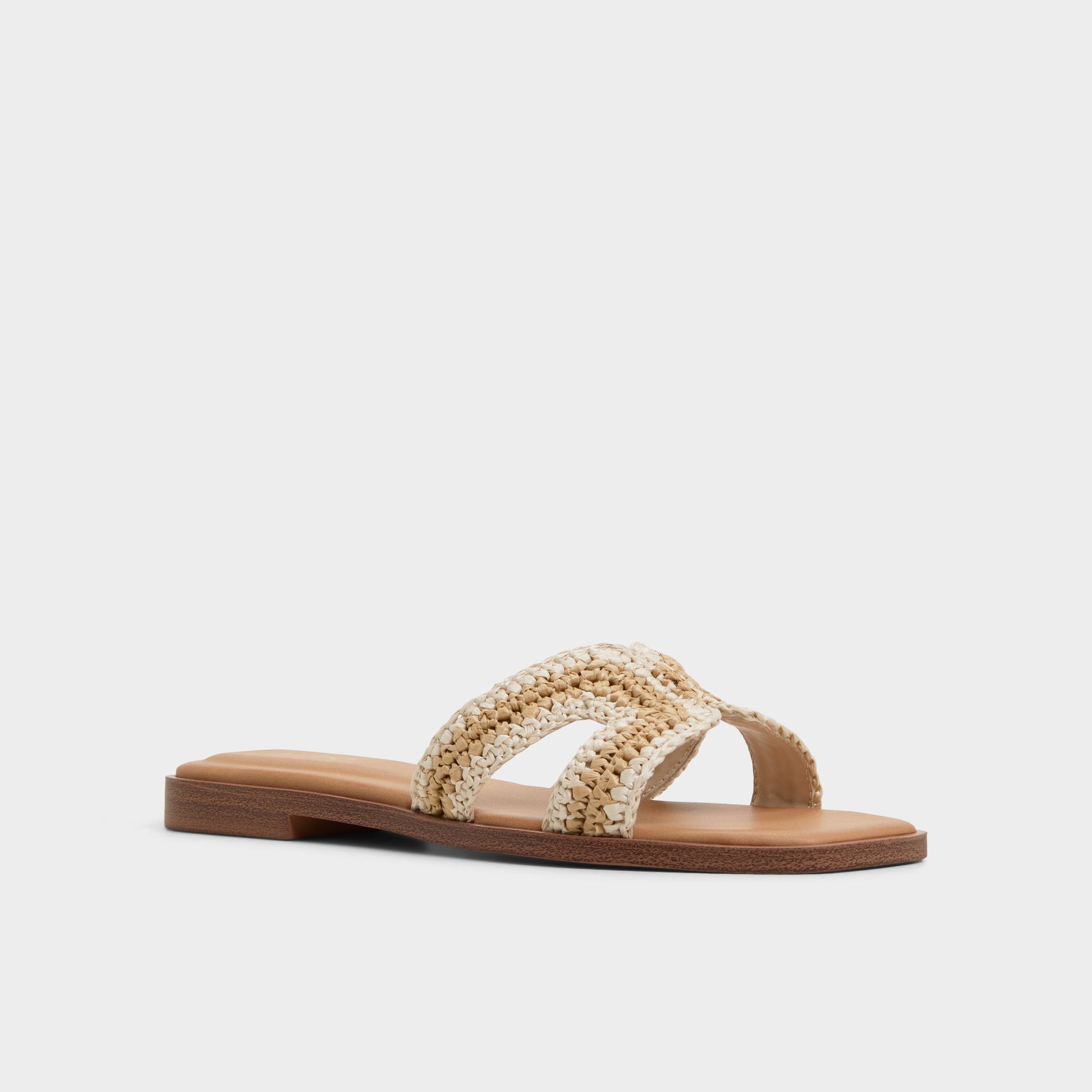 Three-quarter angle of Beige Itsandal Slide sandal's front side