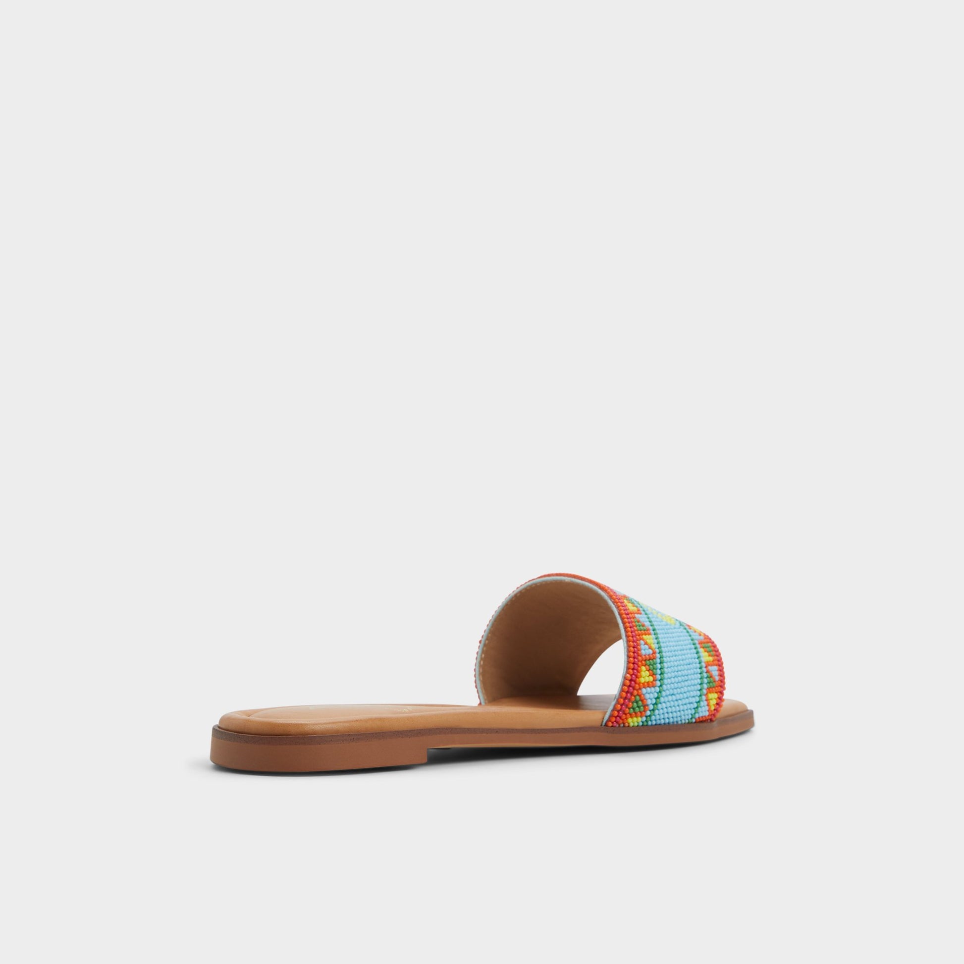Three-quarter angle of Bright Multi Seavacay Slide sandal's back side