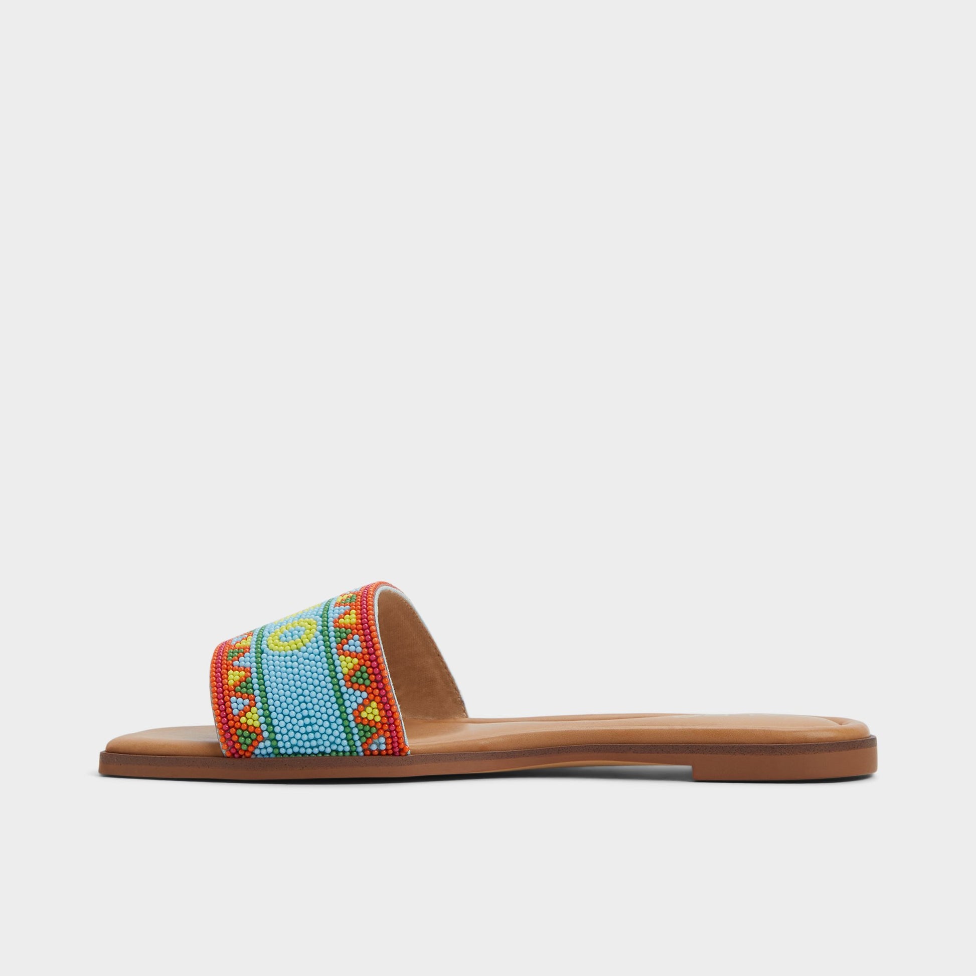 Side view of Bright Multi Seavacay Slide sandal