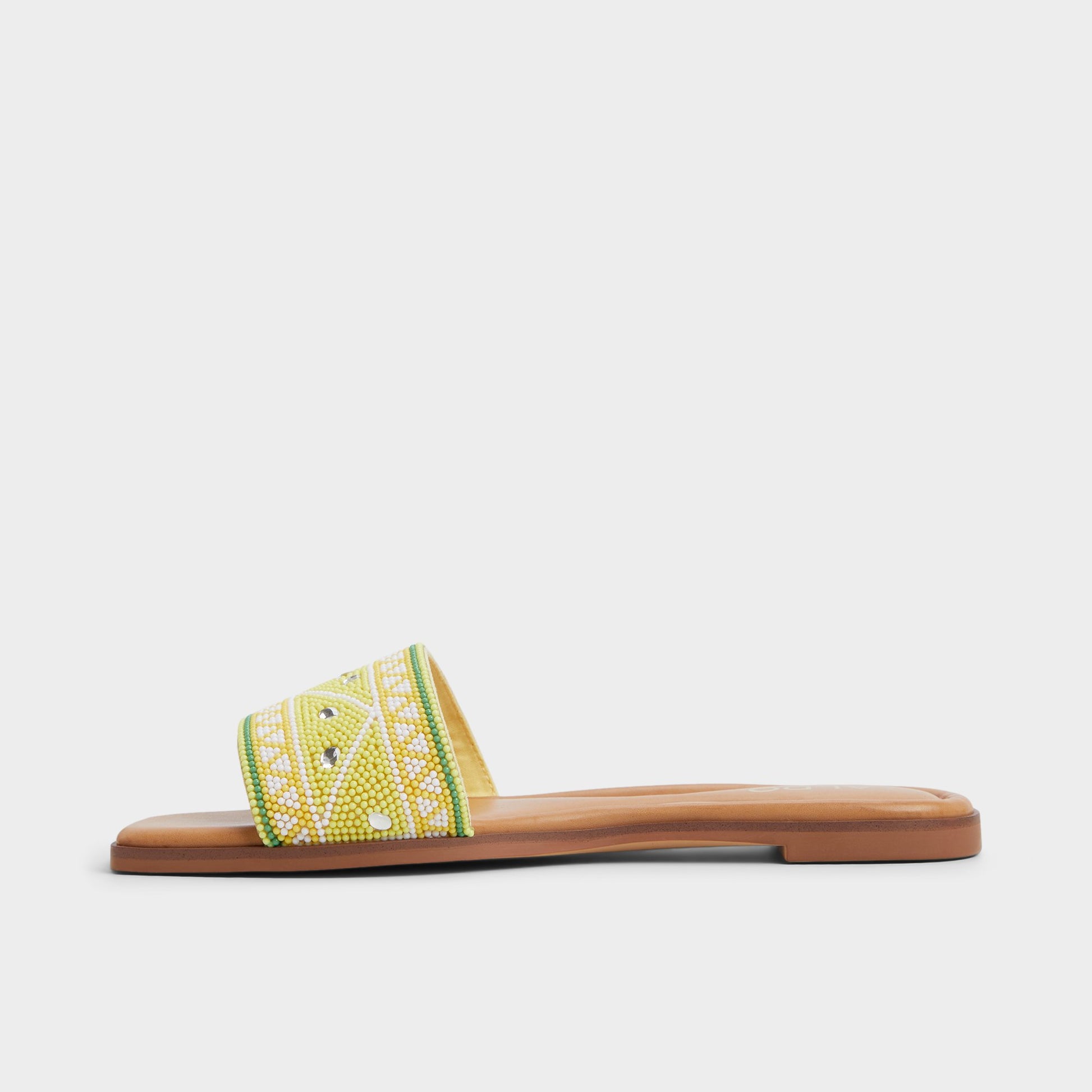 Side view of Bright Yellow Seavacay Slide sandal