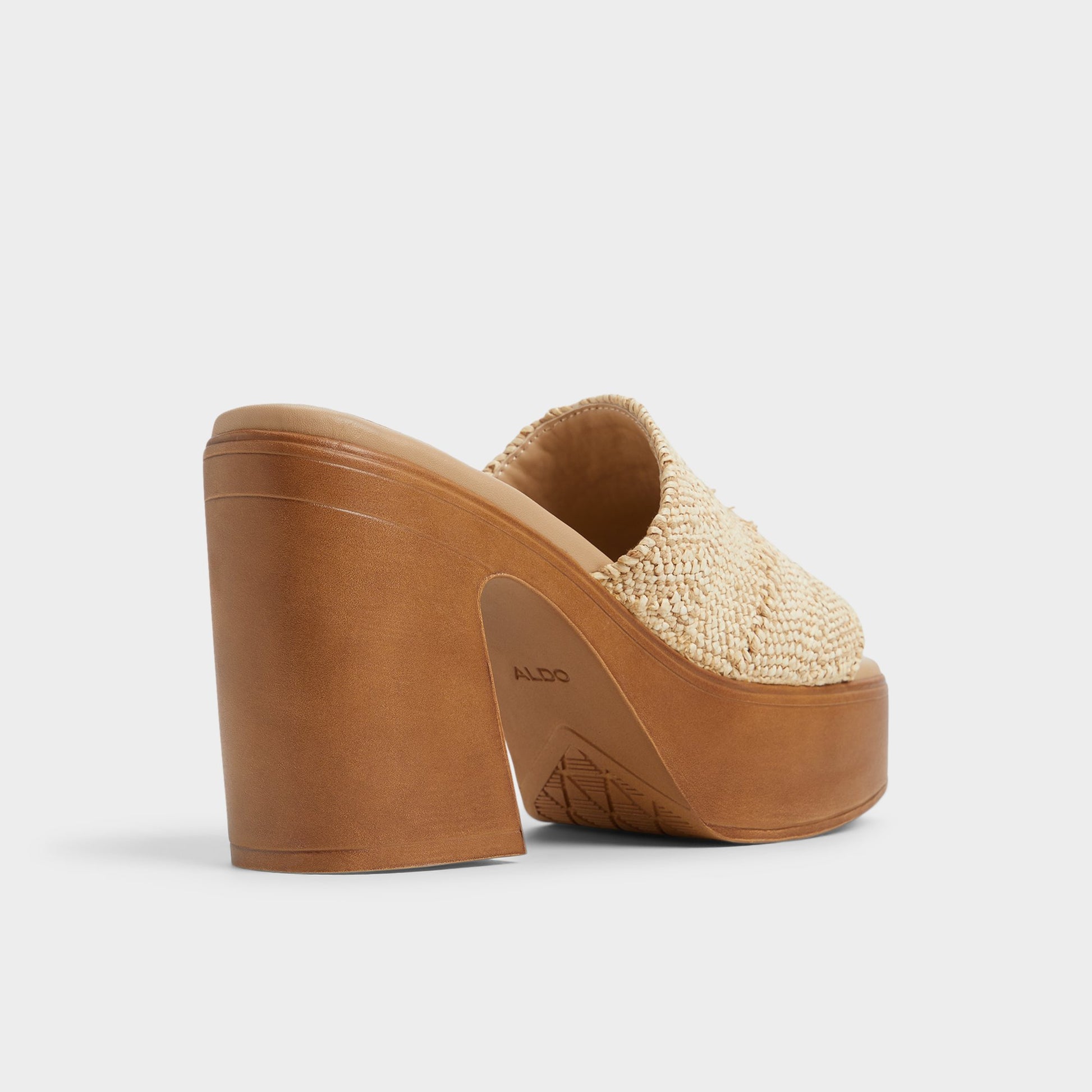 Three-quarter angle of Natural Maysee Heeled mule's back side
