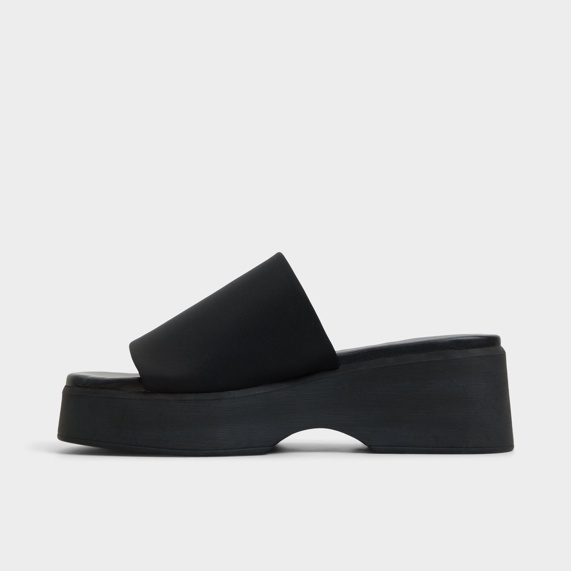 Side view of Black Yassa Wedge sandal