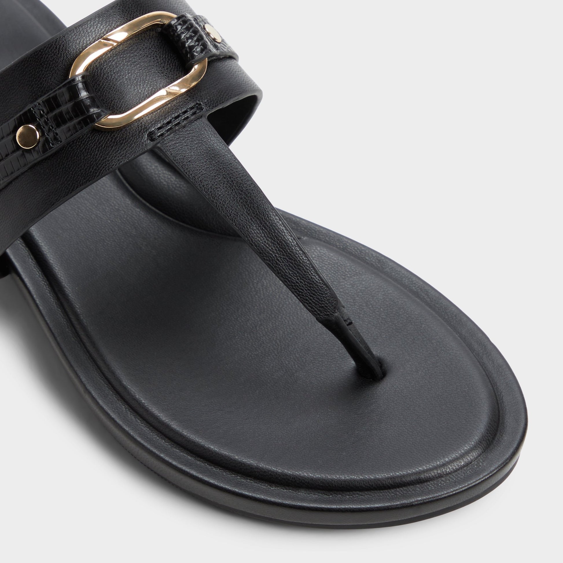 Close-up of the Black Taylen T-strap sandal