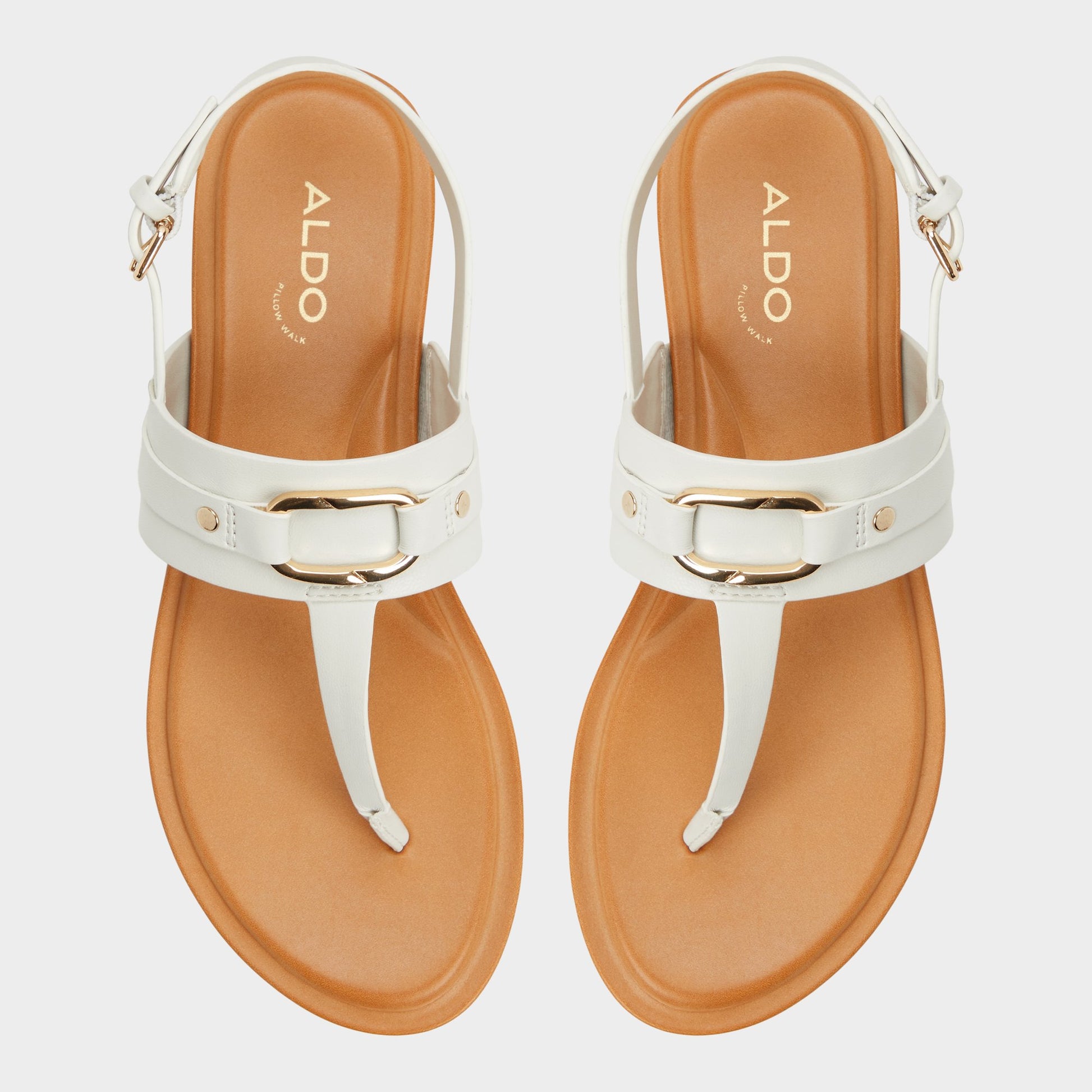 Top-down view of the White/Bone Taylen T-strap sandal