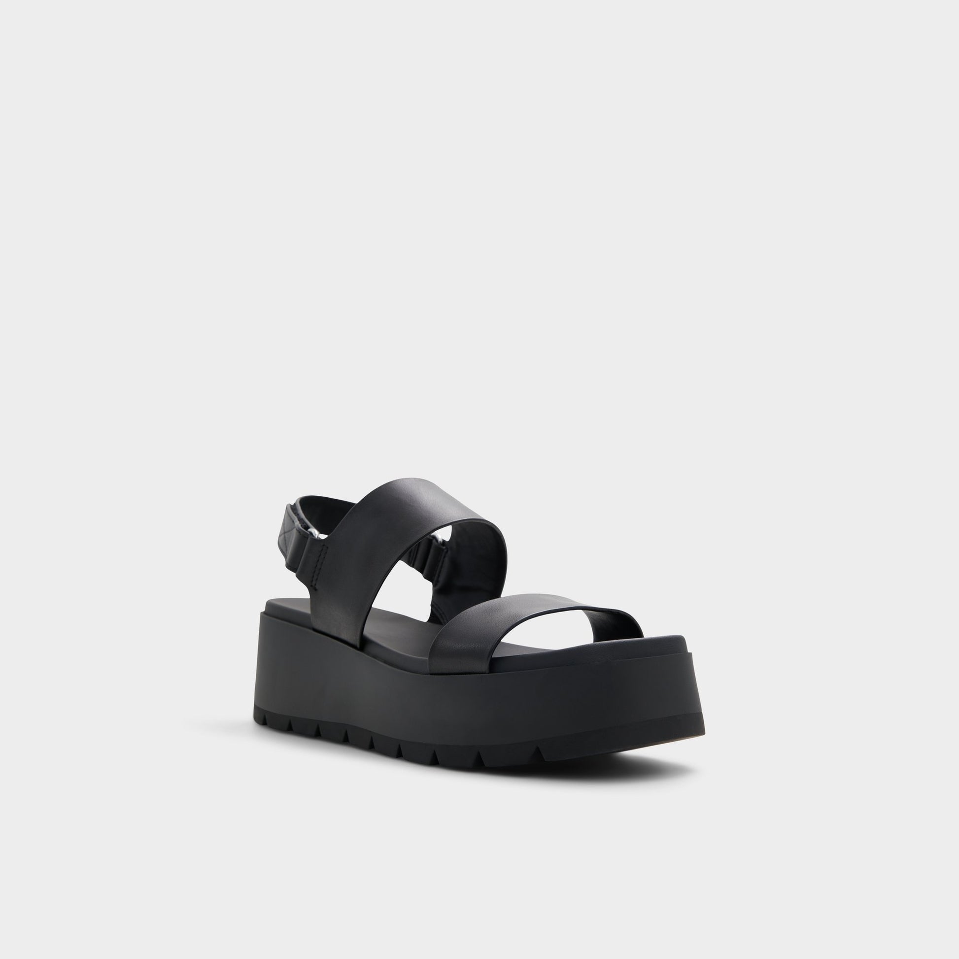 Three-quarter angle of Open Black Thila Wedge sandal's front side