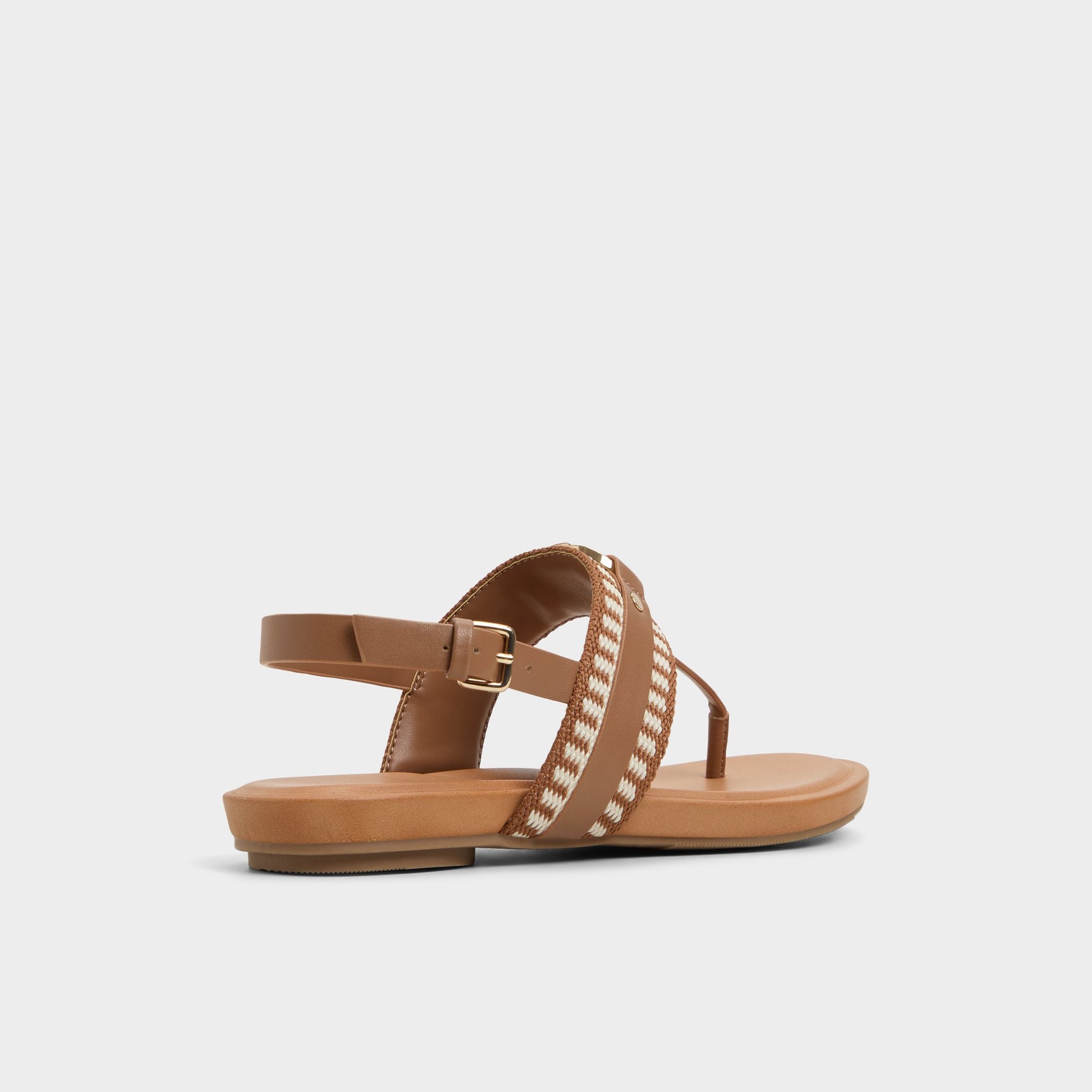 Three-quarter angle of Medium Brown Taylen T-strap sandal's back side