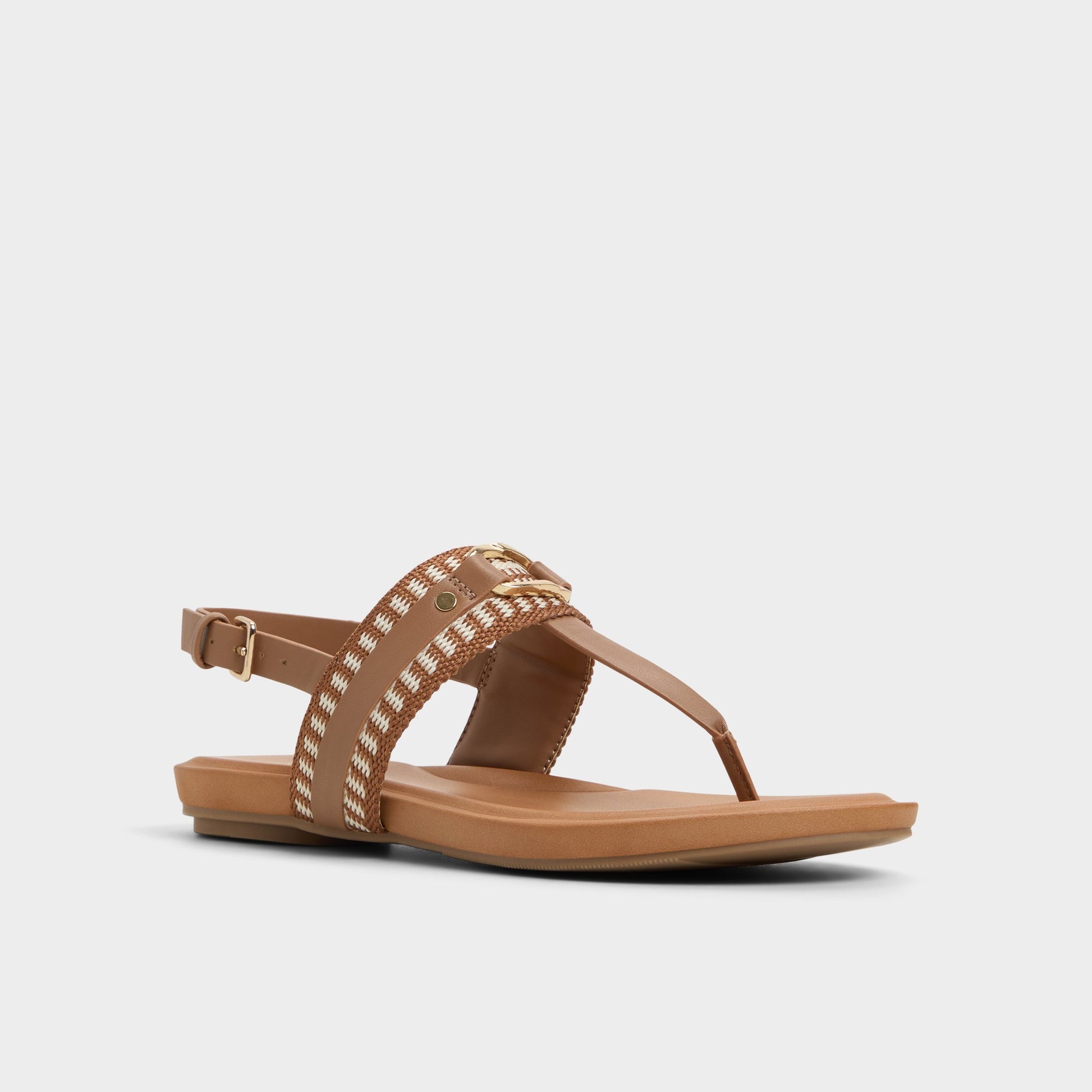 Three-quarter angle of Medium Brown Taylen T-strap sandal's front side