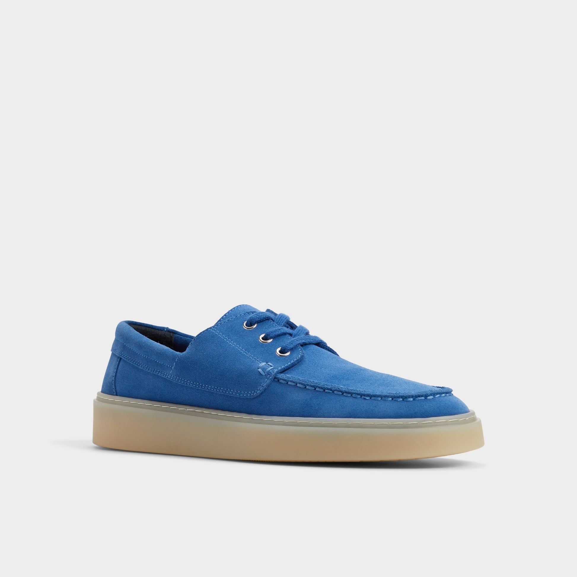 Three-quarter angle of Medium Blue Stazo Boat shoe's front side