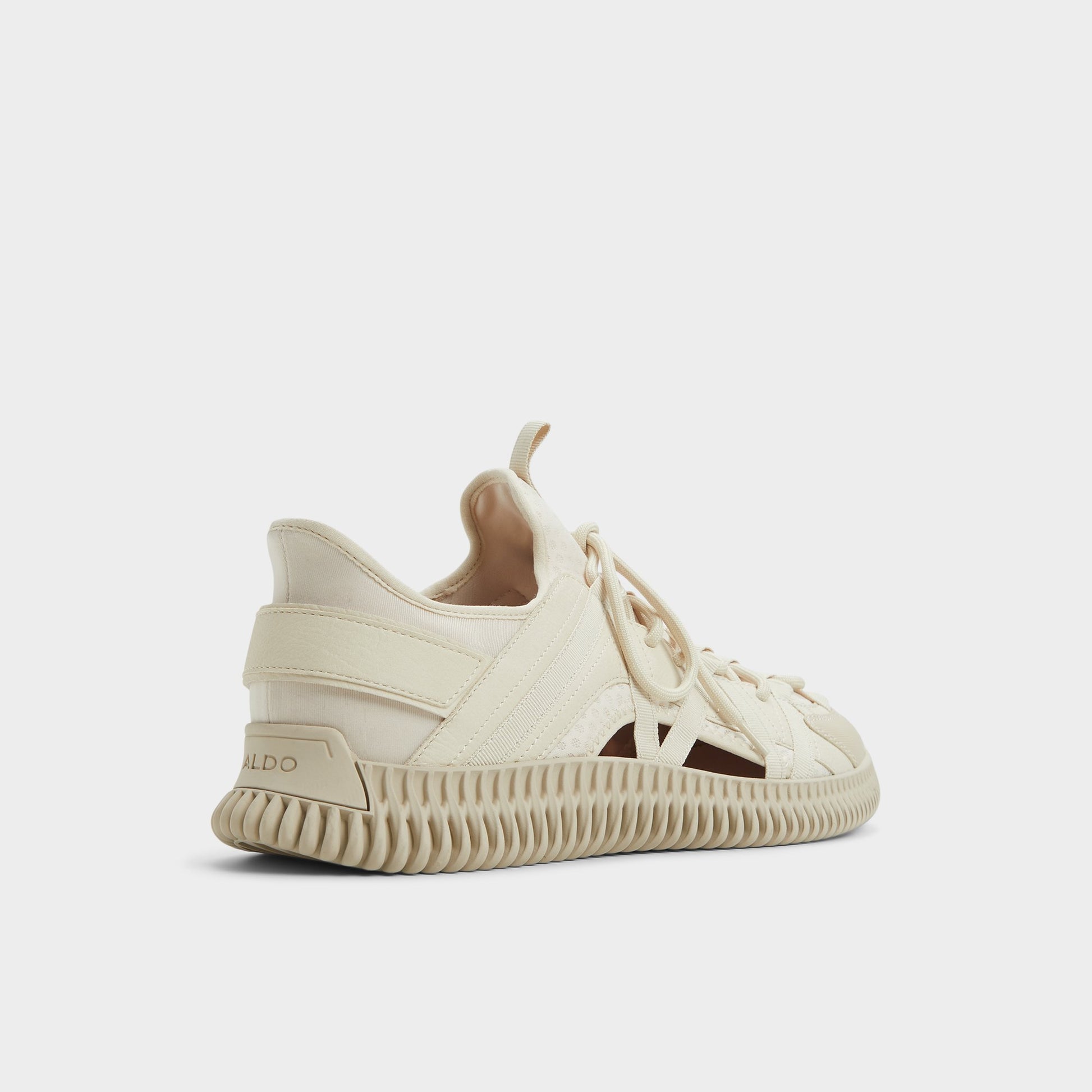Three-quarter angle of Beige Cael Slip-on sneaker's back side