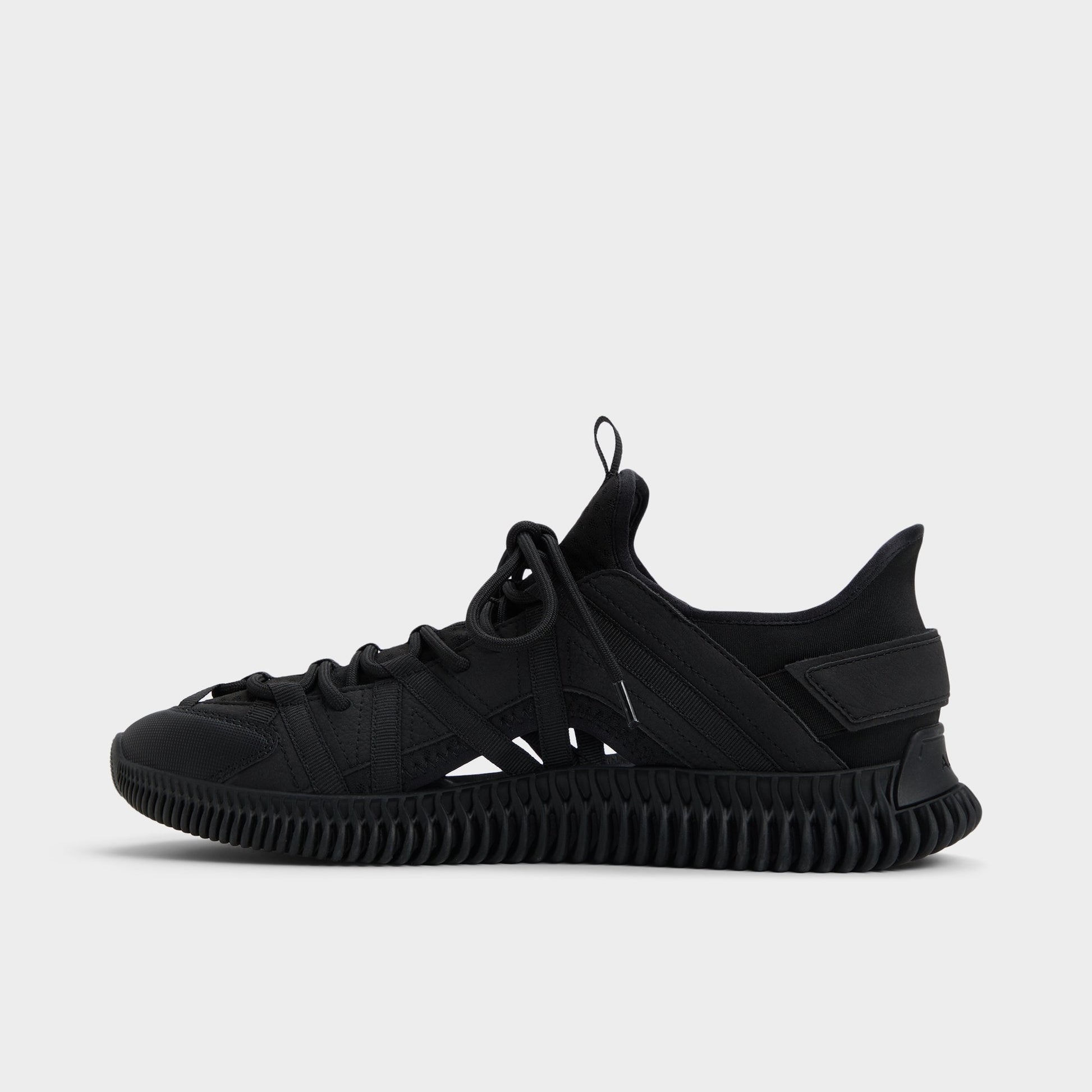 Side view of Black Cael Slip-on sneaker