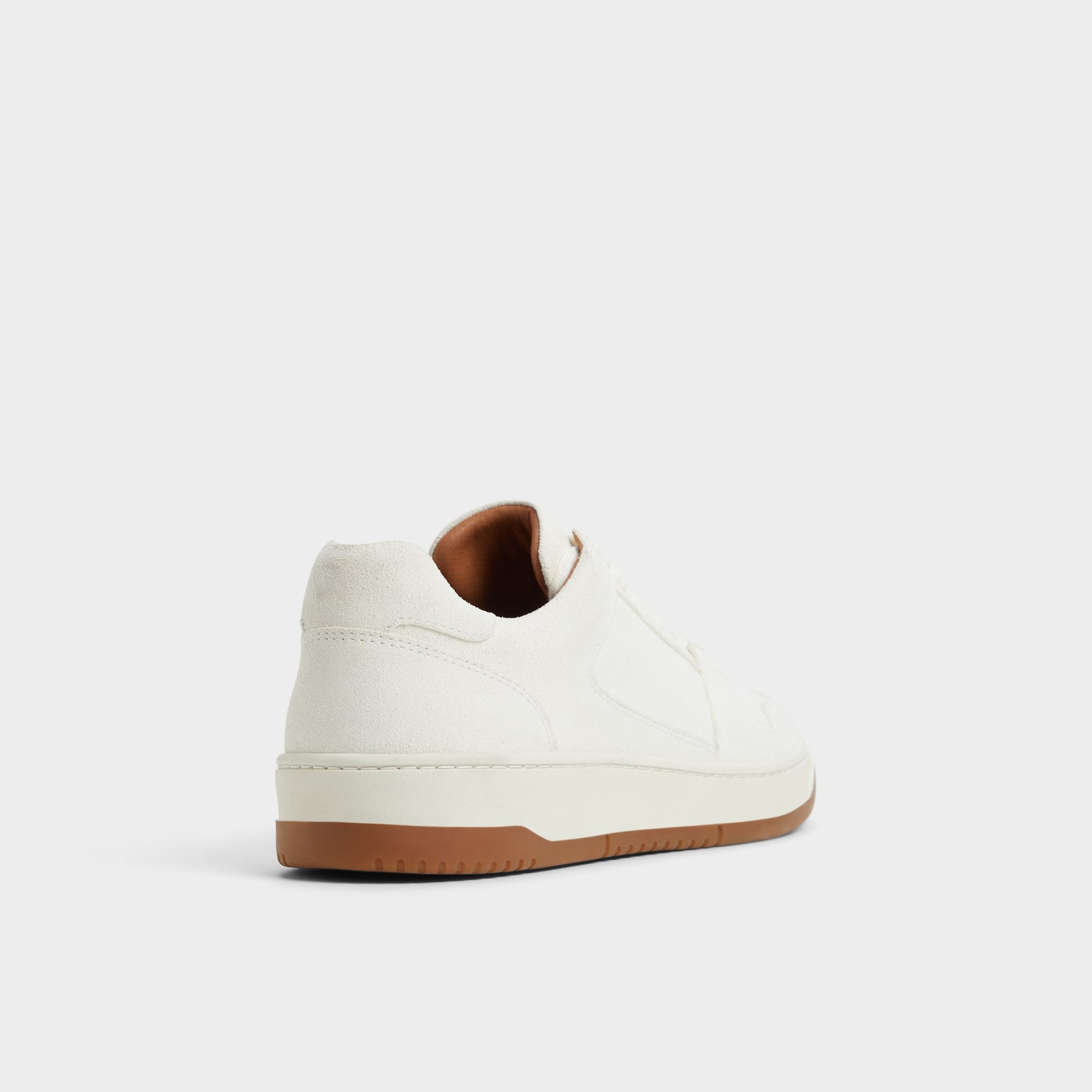 Three-quarter angle of White Ludlow Low top sneaker's back side