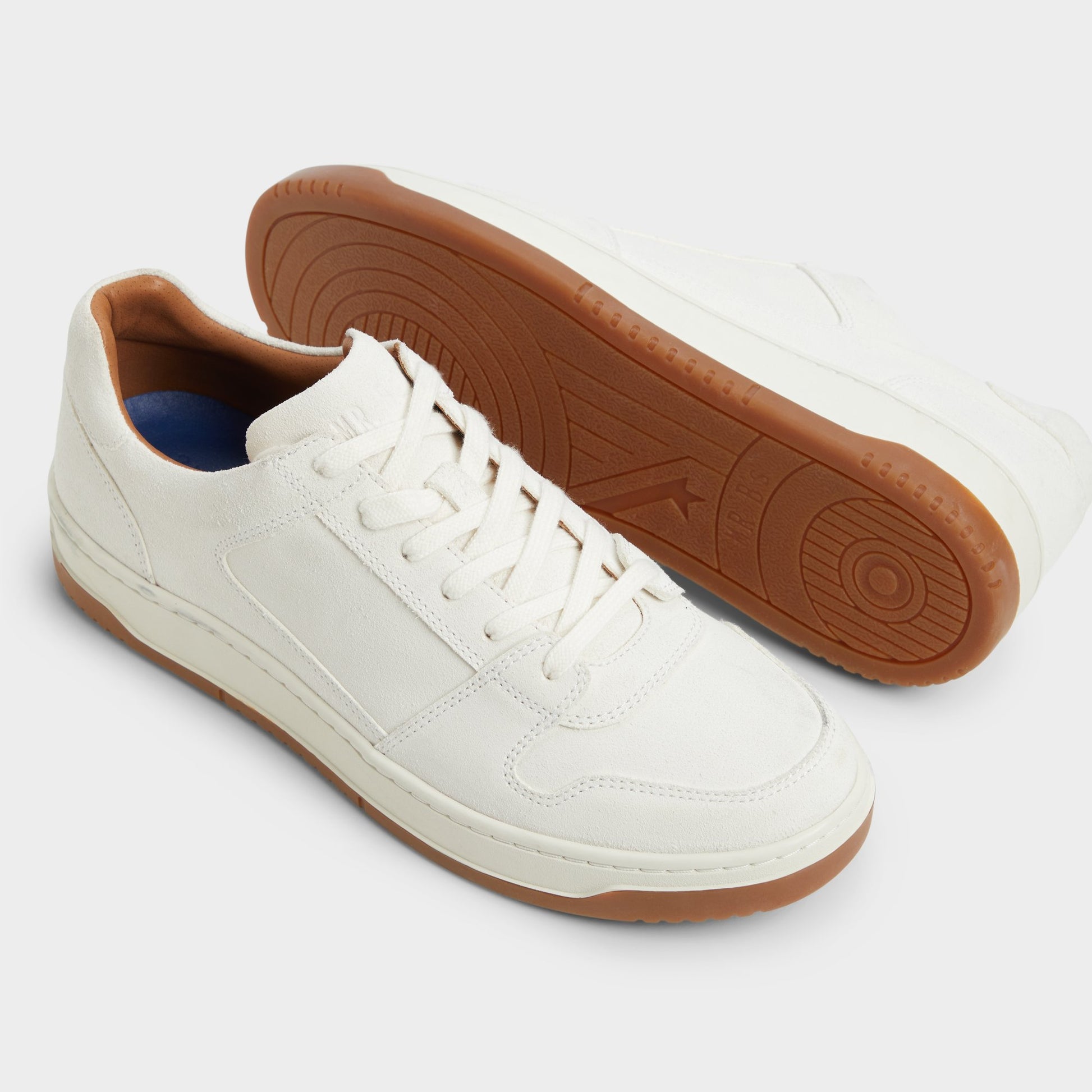 Highlighted view of a pair of White Ludlow Low top sneakers