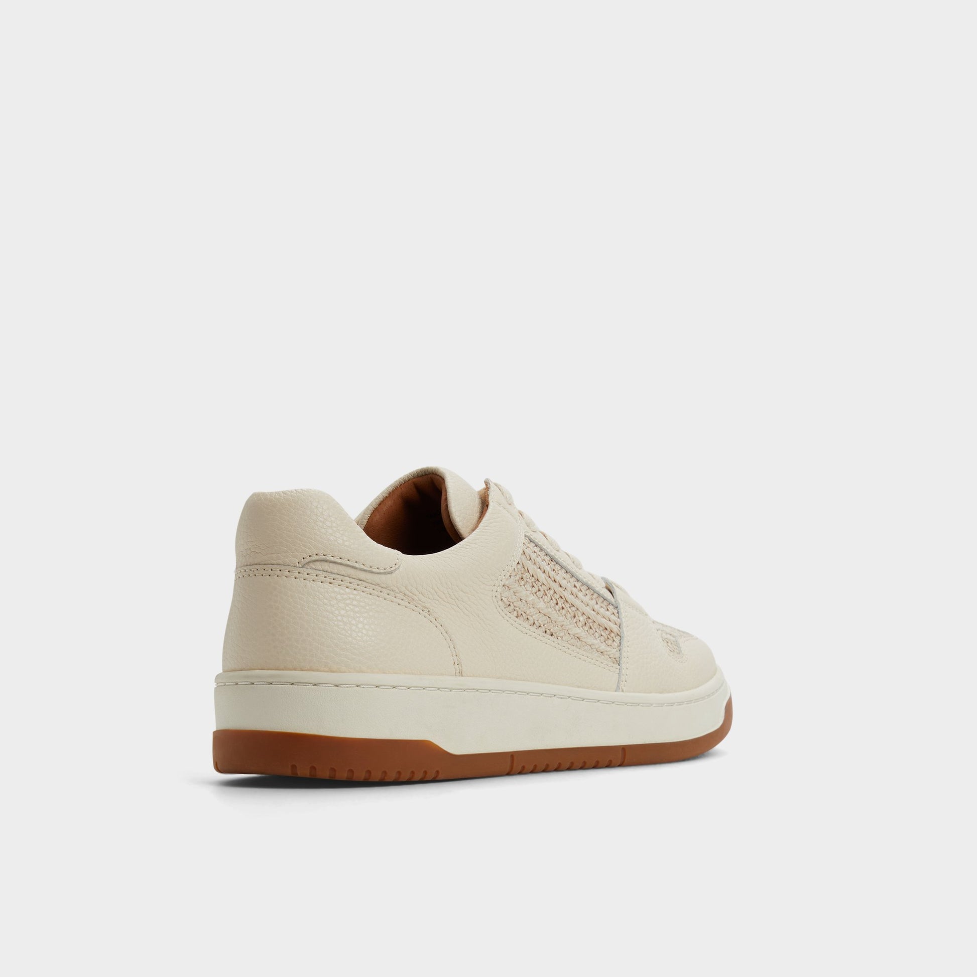 Three-quarter angle of White Ludlow Low top sneaker's back side