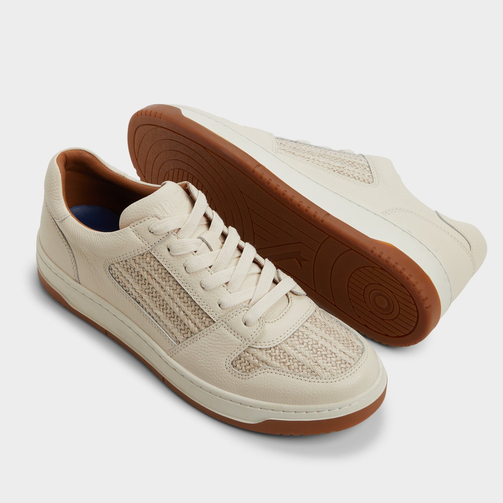 Highlighted view of a pair of White Ludlow Low top sneakers