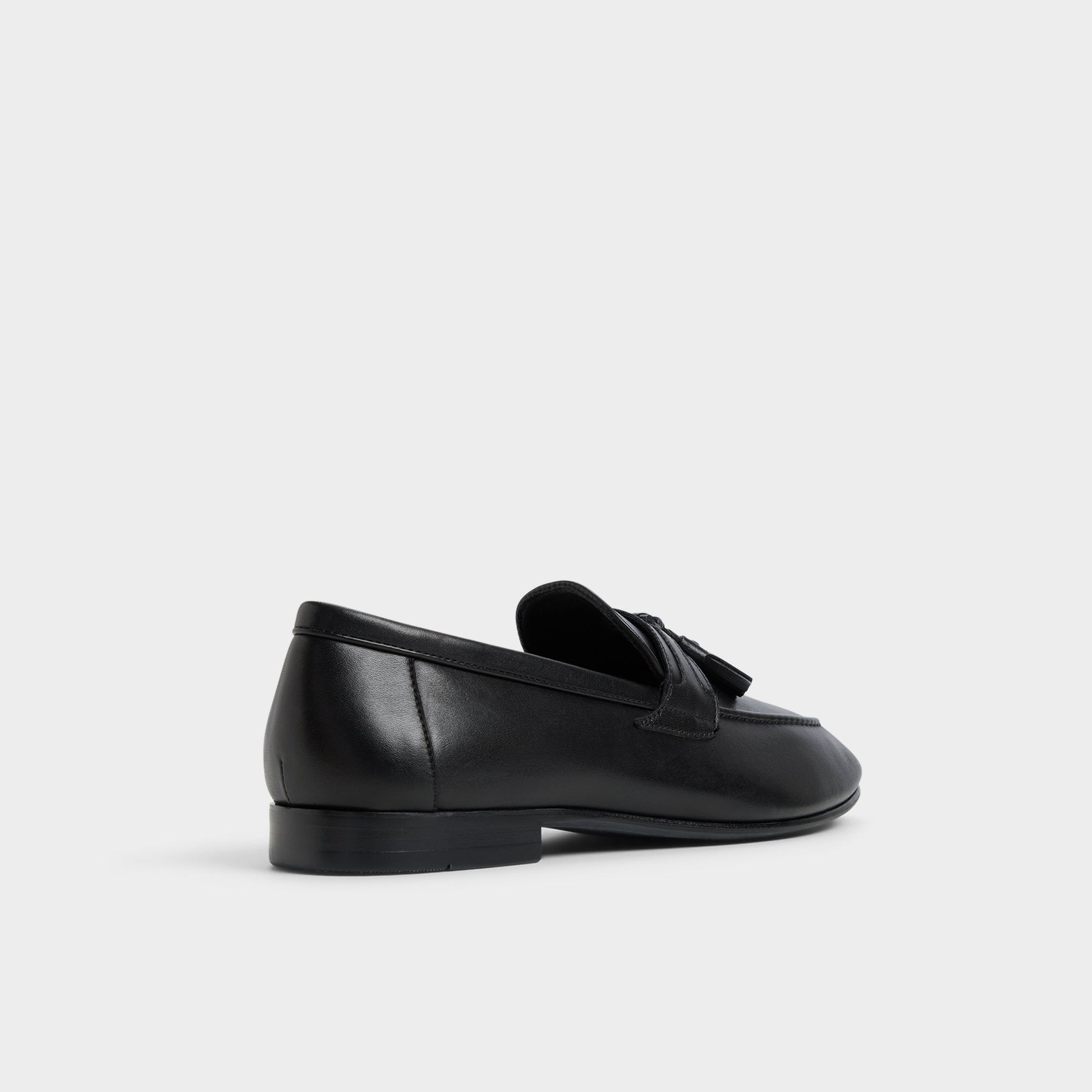 Three-quarter angle of Black Grover Loafer's back side