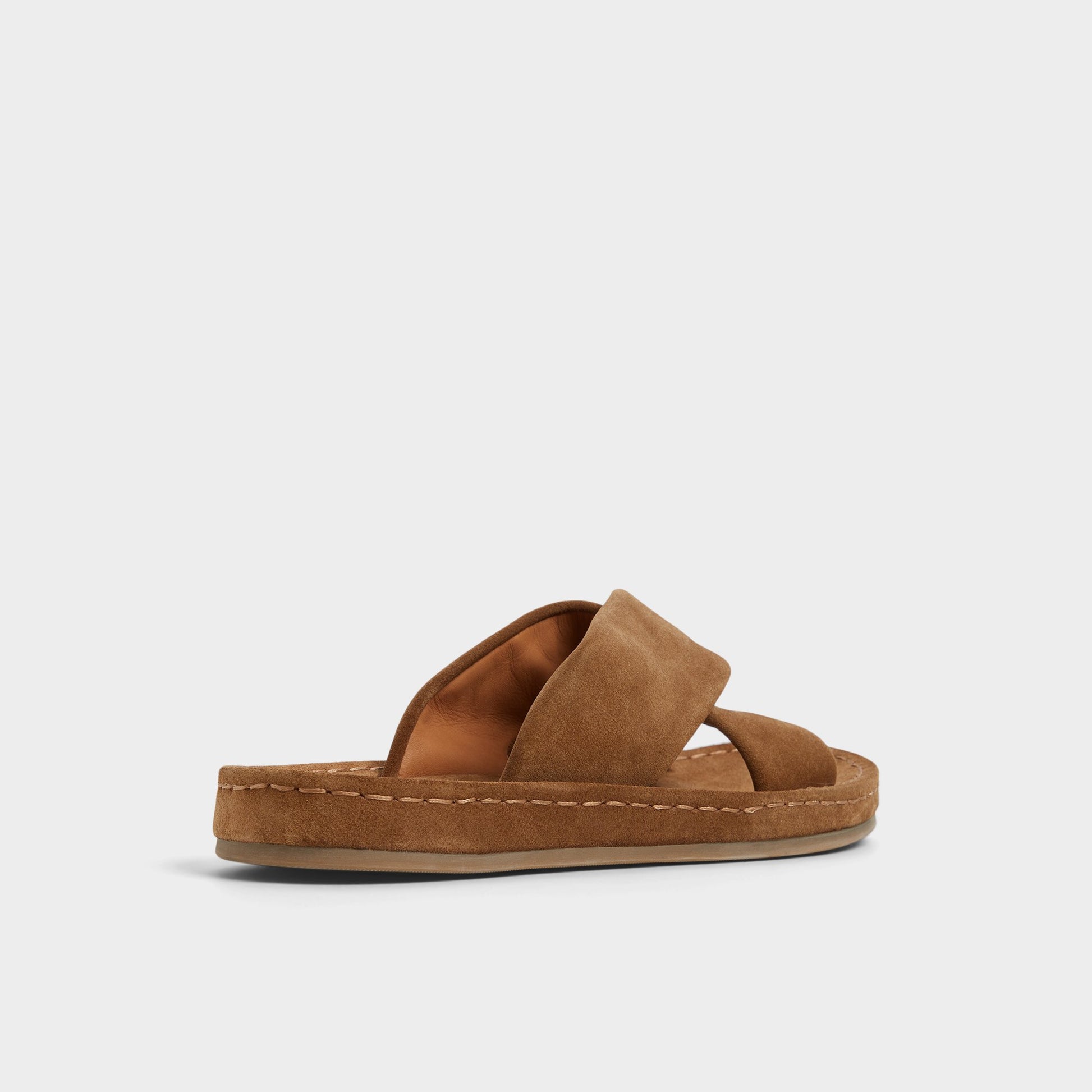 Three-quarter angle of Light Brown Steele Slide sandal's back side