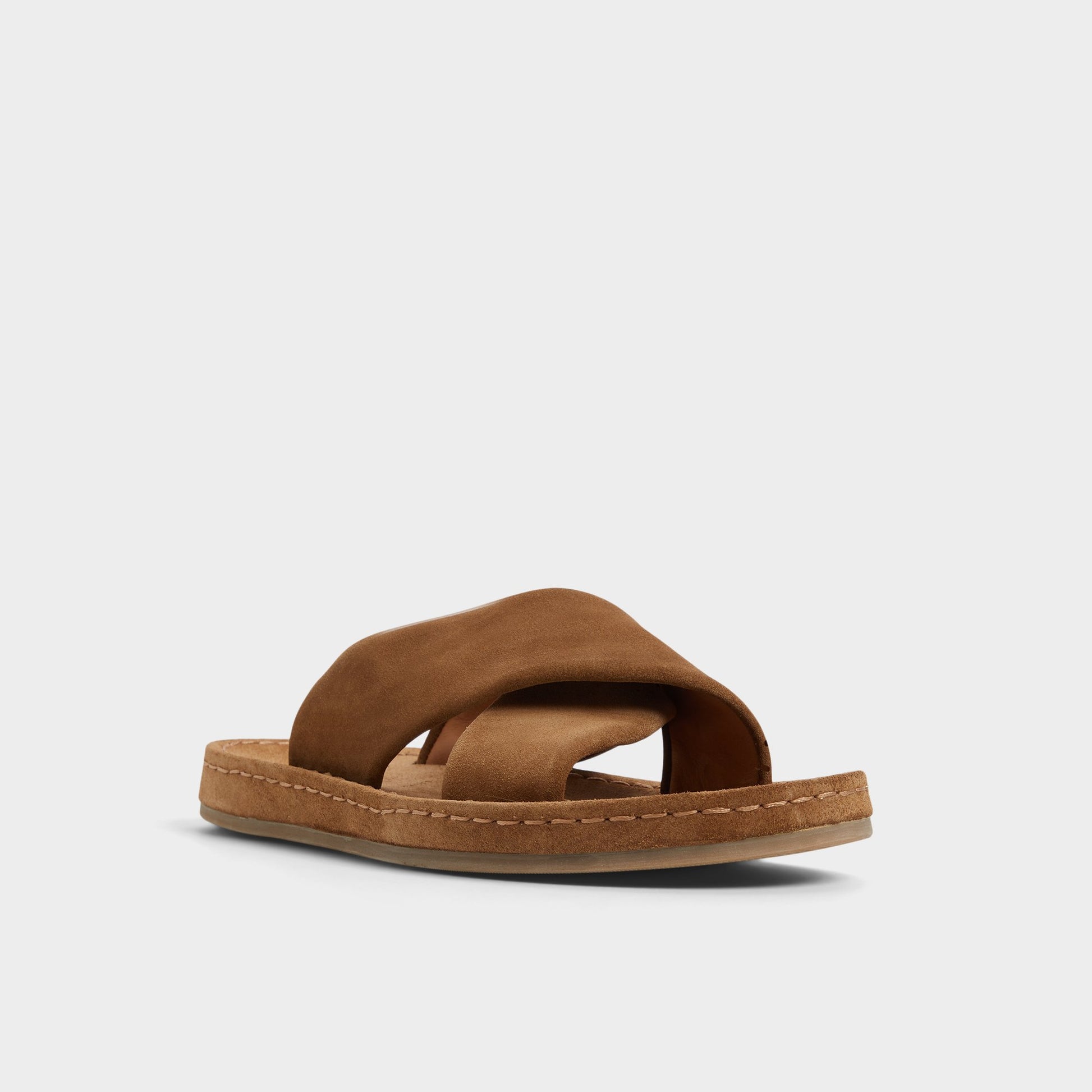 Three-quarter angle of Light Brown Steele Slide sandal's front side