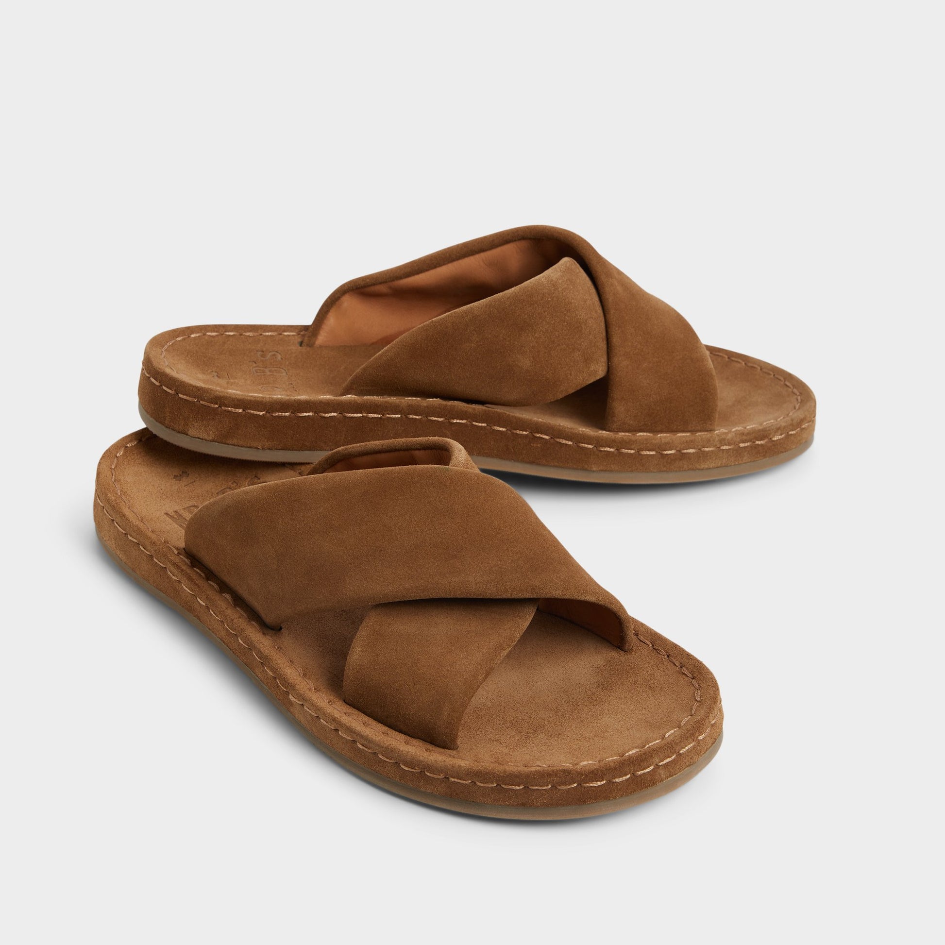 Highlighted view of a pair of Light Brown Steele Slide sandals