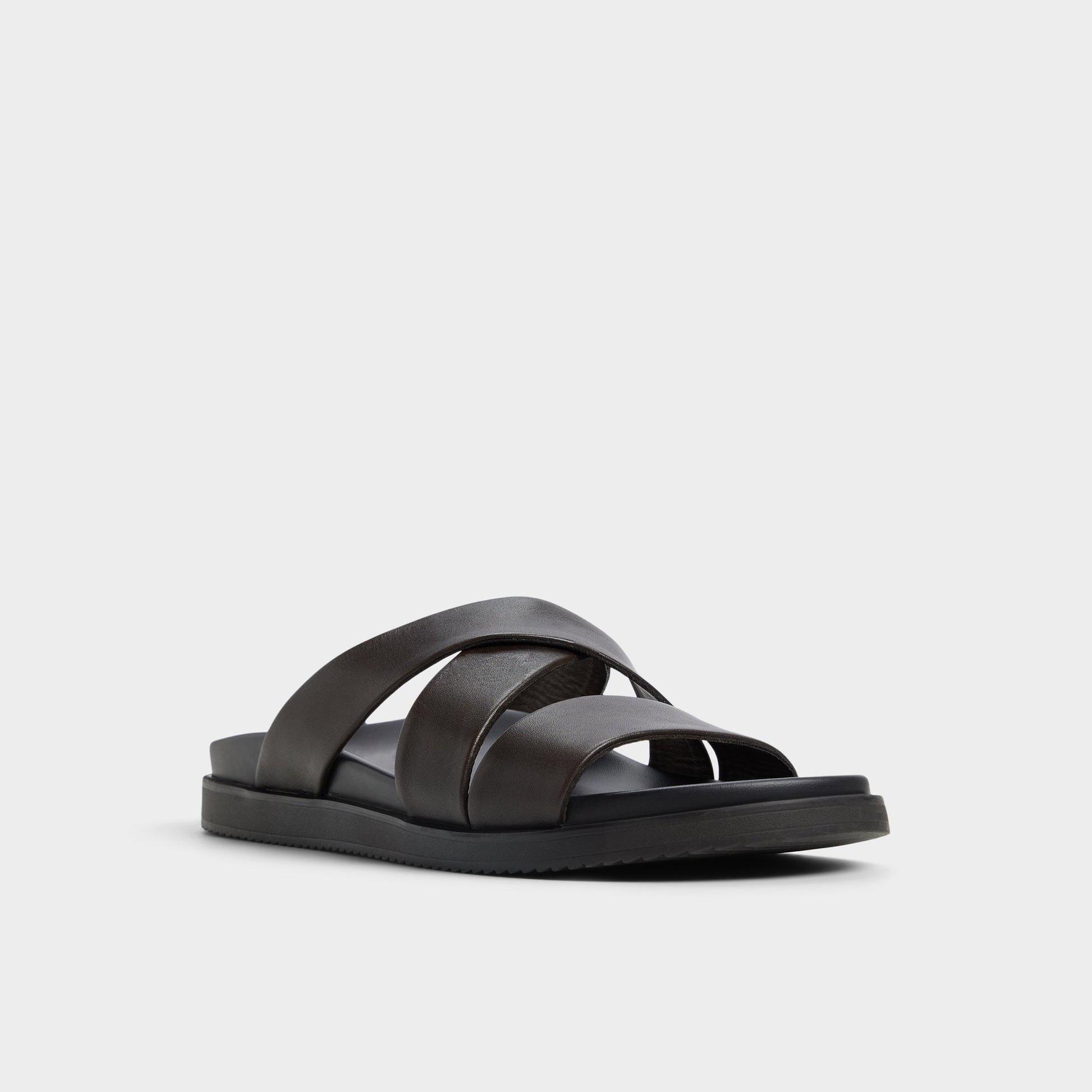 Three-quarter angle of Dark Brown Kairo Slide sandal's front side