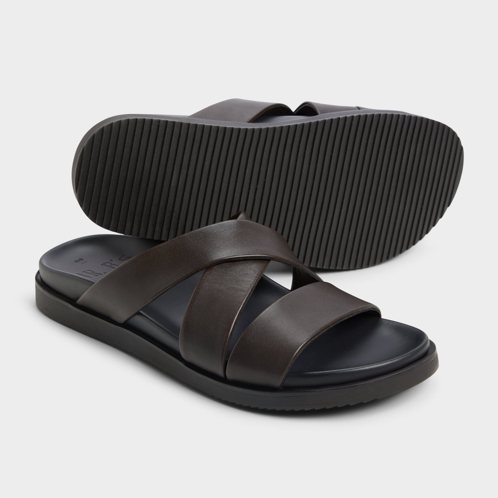 Highlighted view of a pair of Dark Brown Kairo Slide sandals