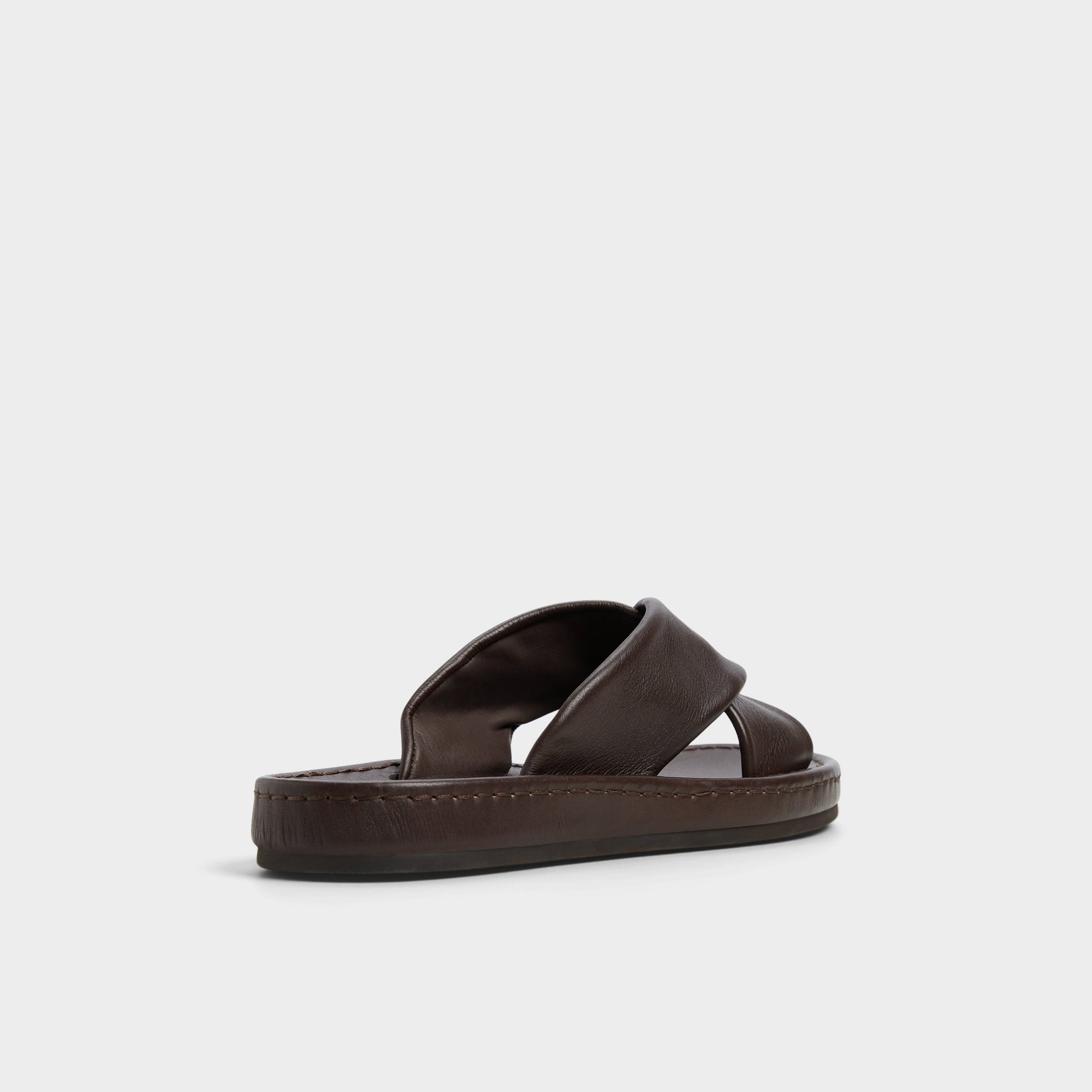Three-quarter angle of Dark Brown Steele Slide sandal's back side