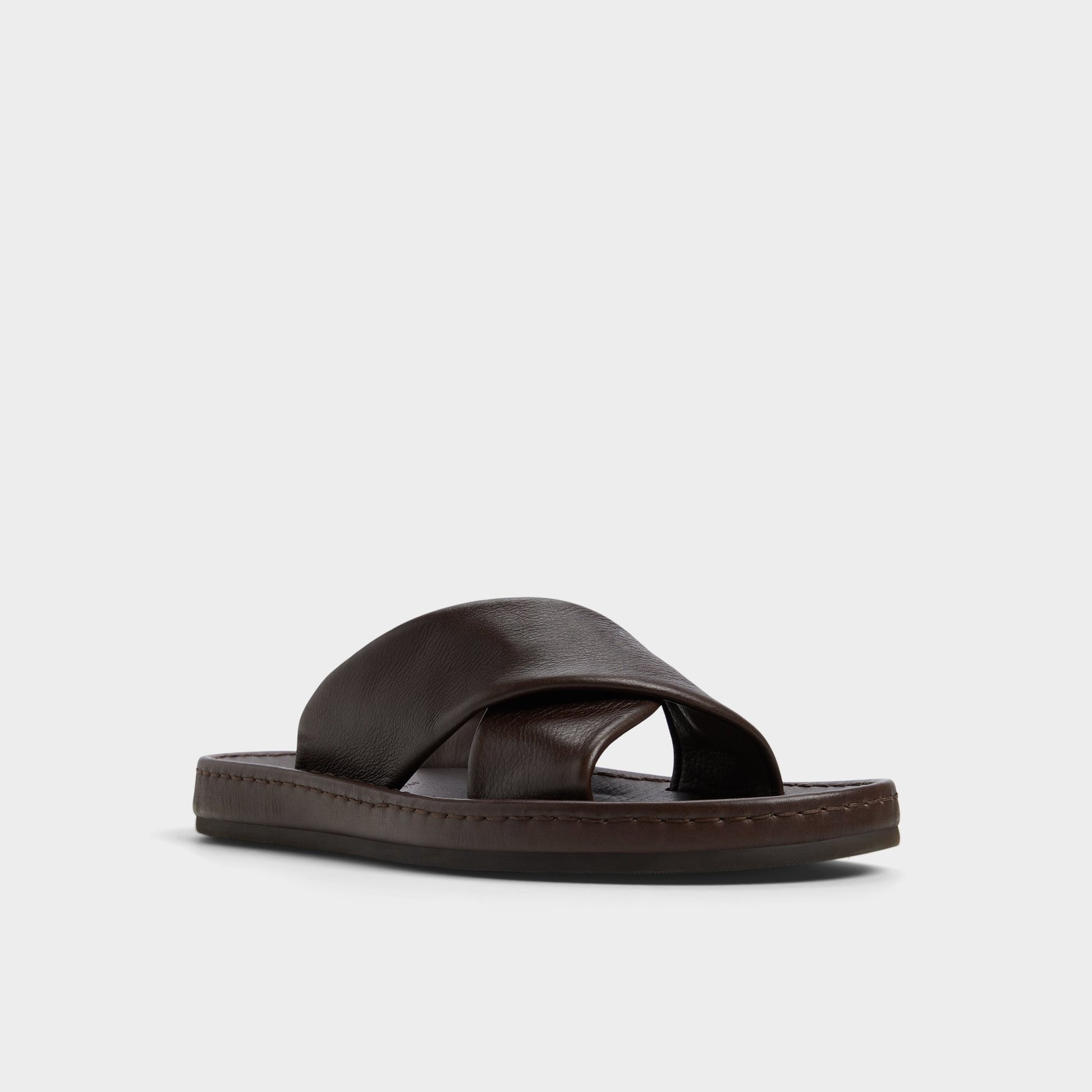 Three-quarter angle of Dark Brown Steele Slide sandal's front side