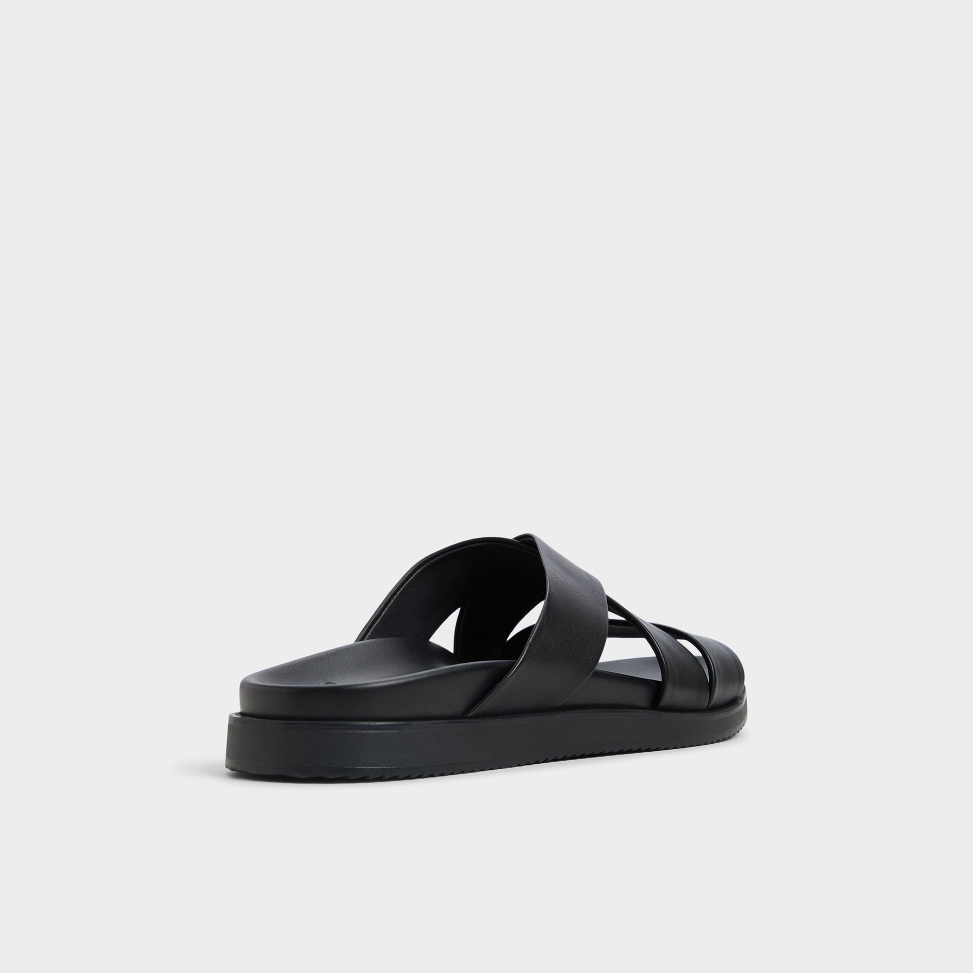Three-quarter angle of Black Kairo Slide sandal's back side