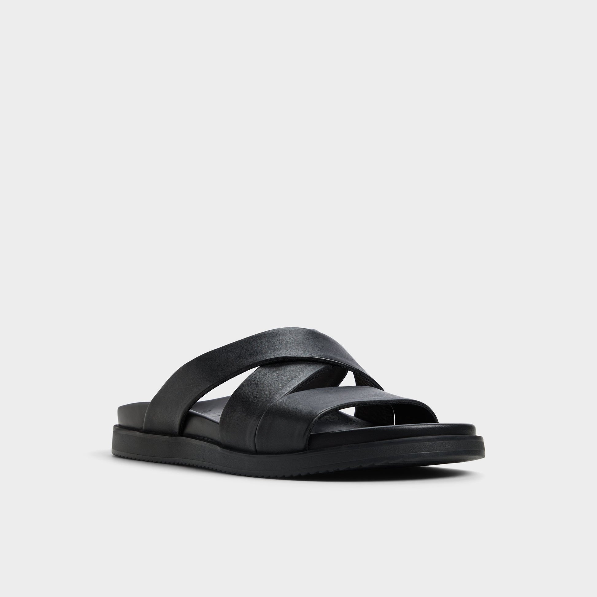 Three-quarter angle of Black Kairo Slide sandal's front side