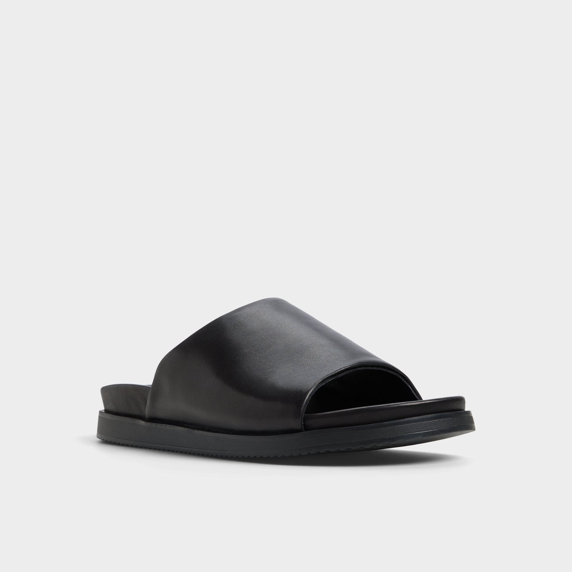 Three-quarter angle of Black Valor Slide sandal's front side