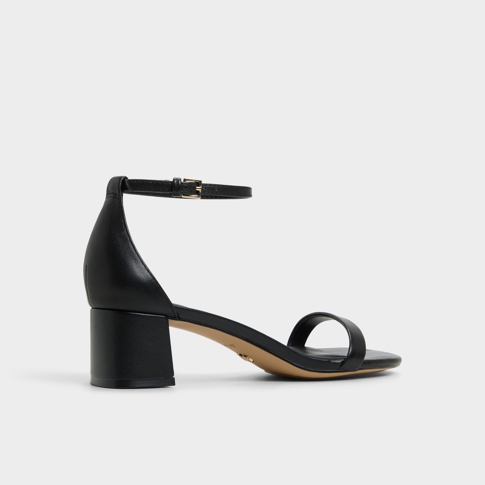 Three-quarter angle of Black Calliope Heeled sandal's back side