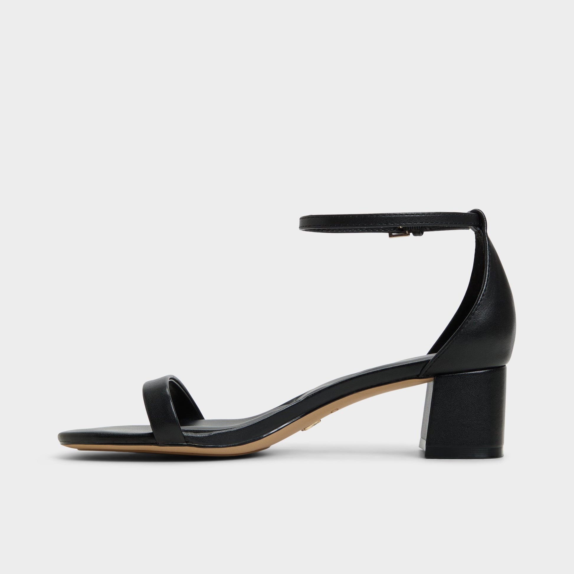 Side view of Black Calliope Heeled sandal