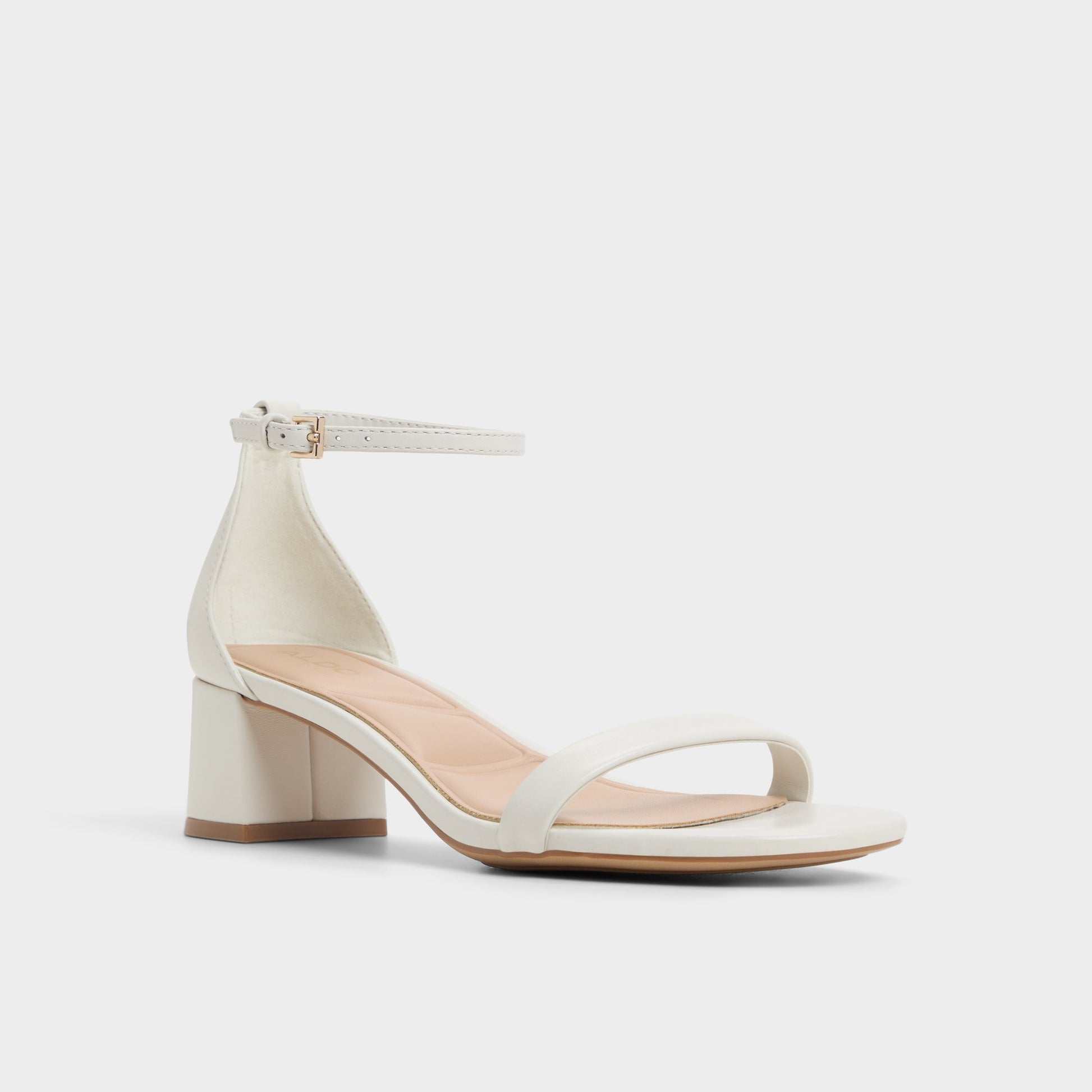 Three-quarter angle of White/Bone Calliope Heeled sandal's front side