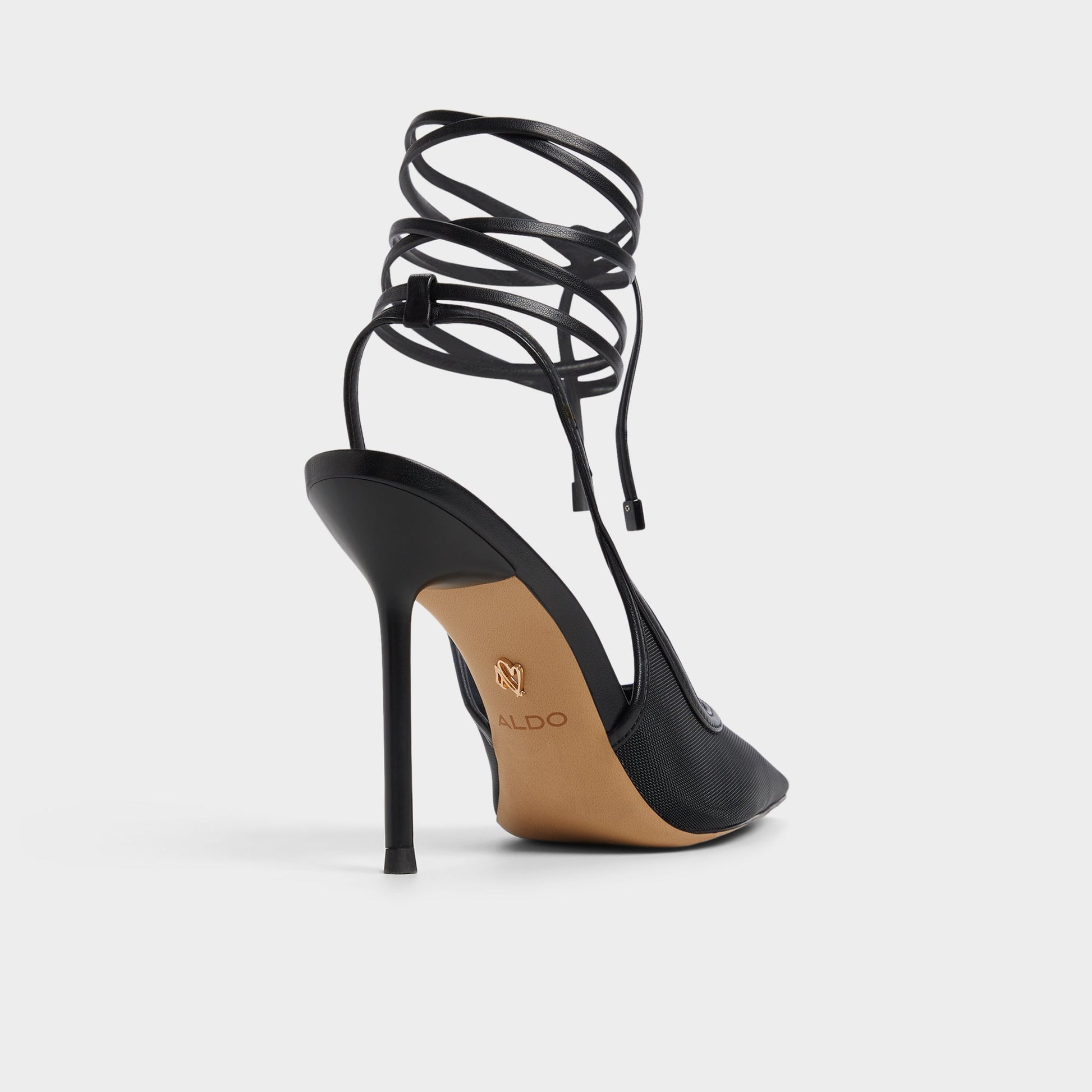 Three-quarter angle of Black Pearsly Slingback heel's back side