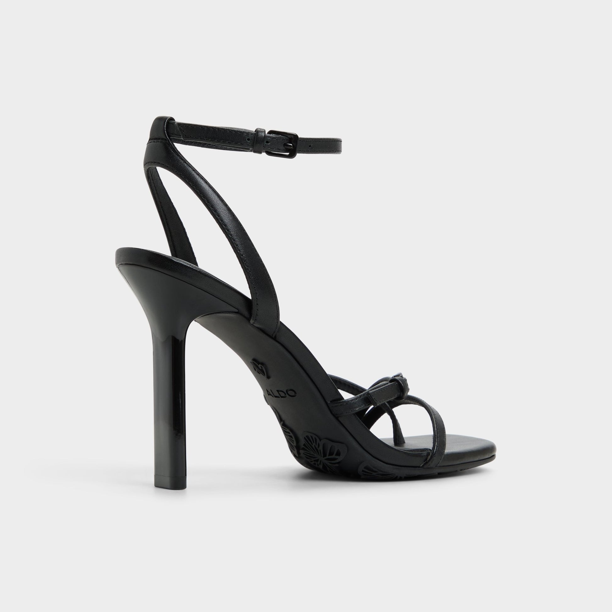 Three-quarter angle of Black Conney Strappy heeled sandal's back side