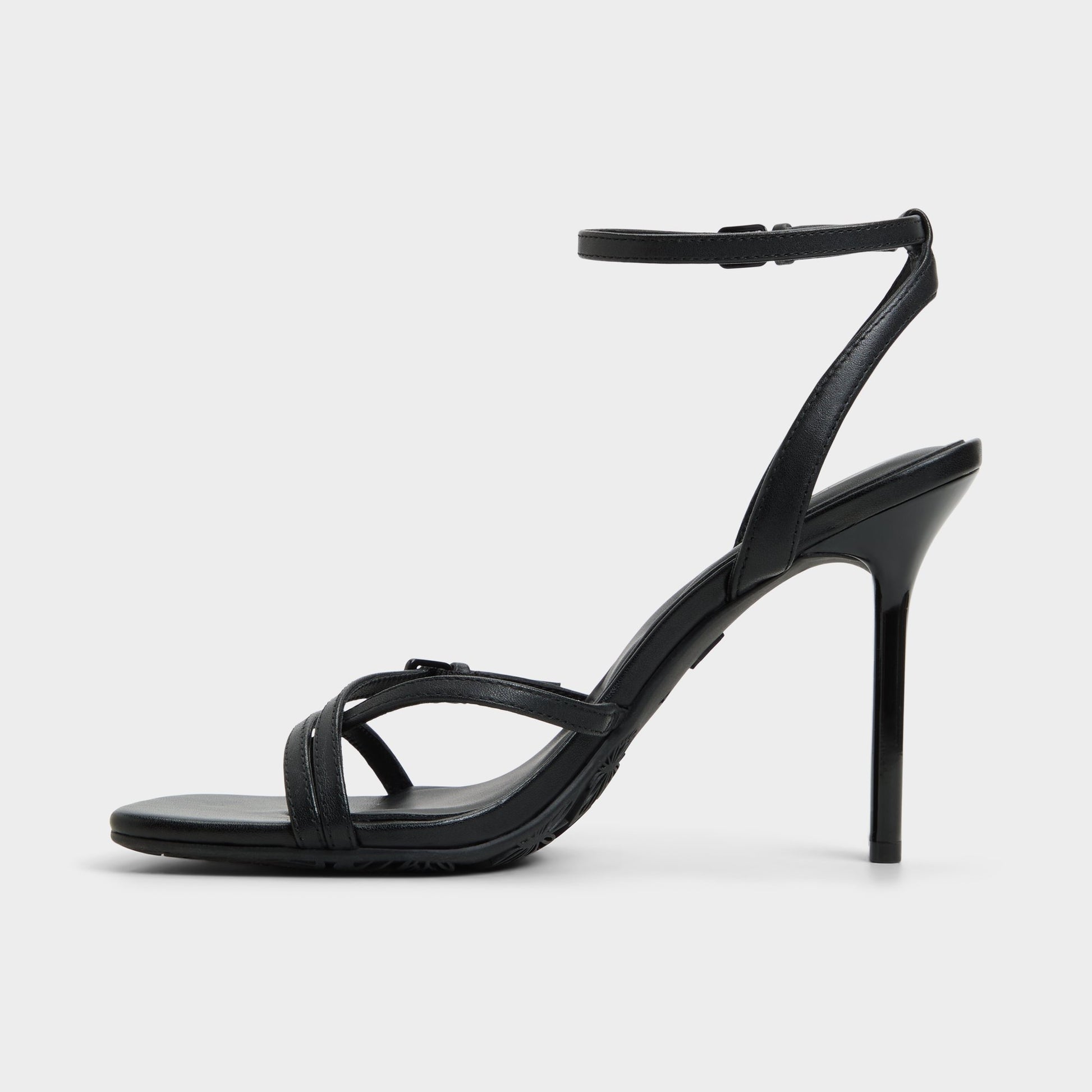 Side view of Black Conney Strappy heeled sandal