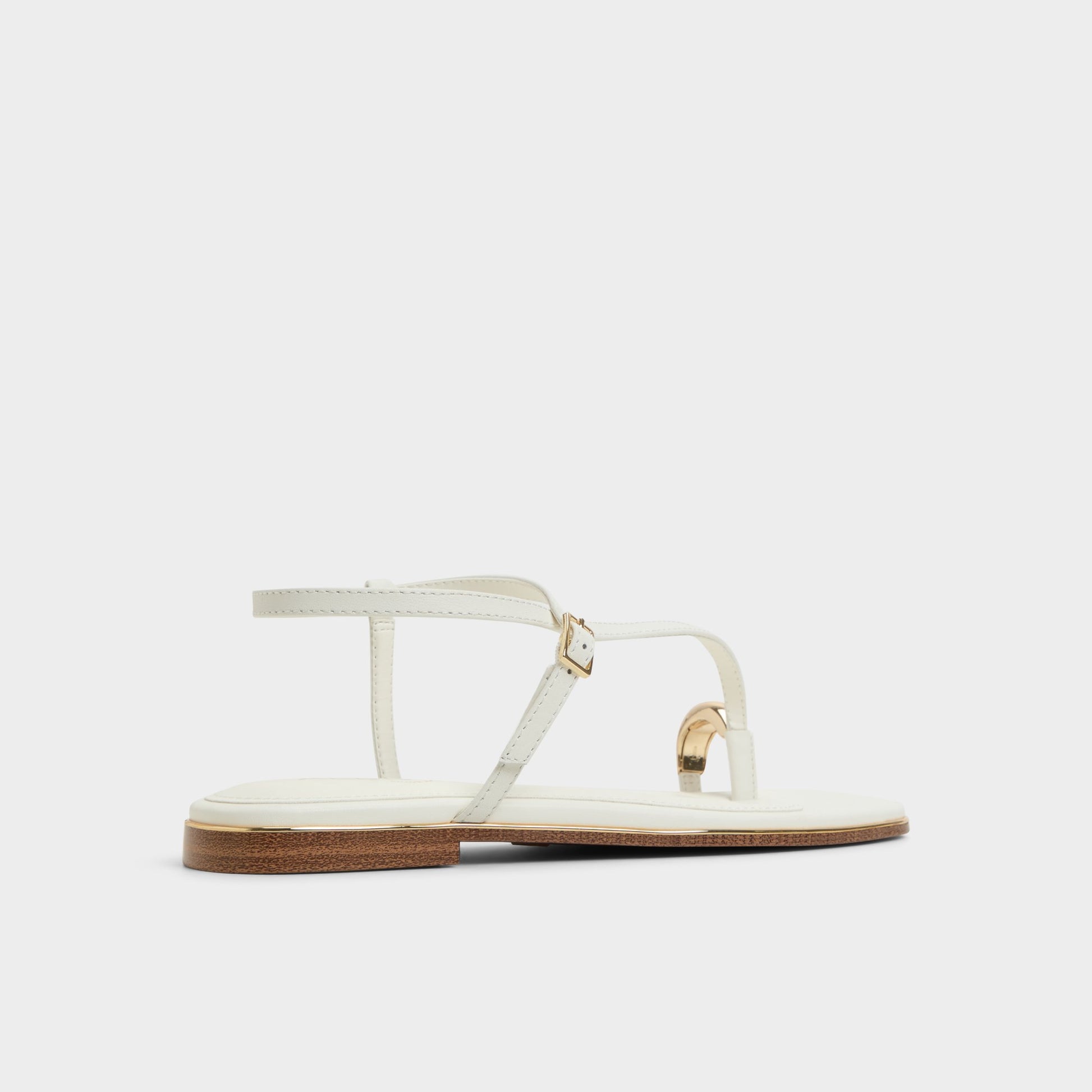 Three-quarter angle of White Jomalina Strappy flat sandal's back side