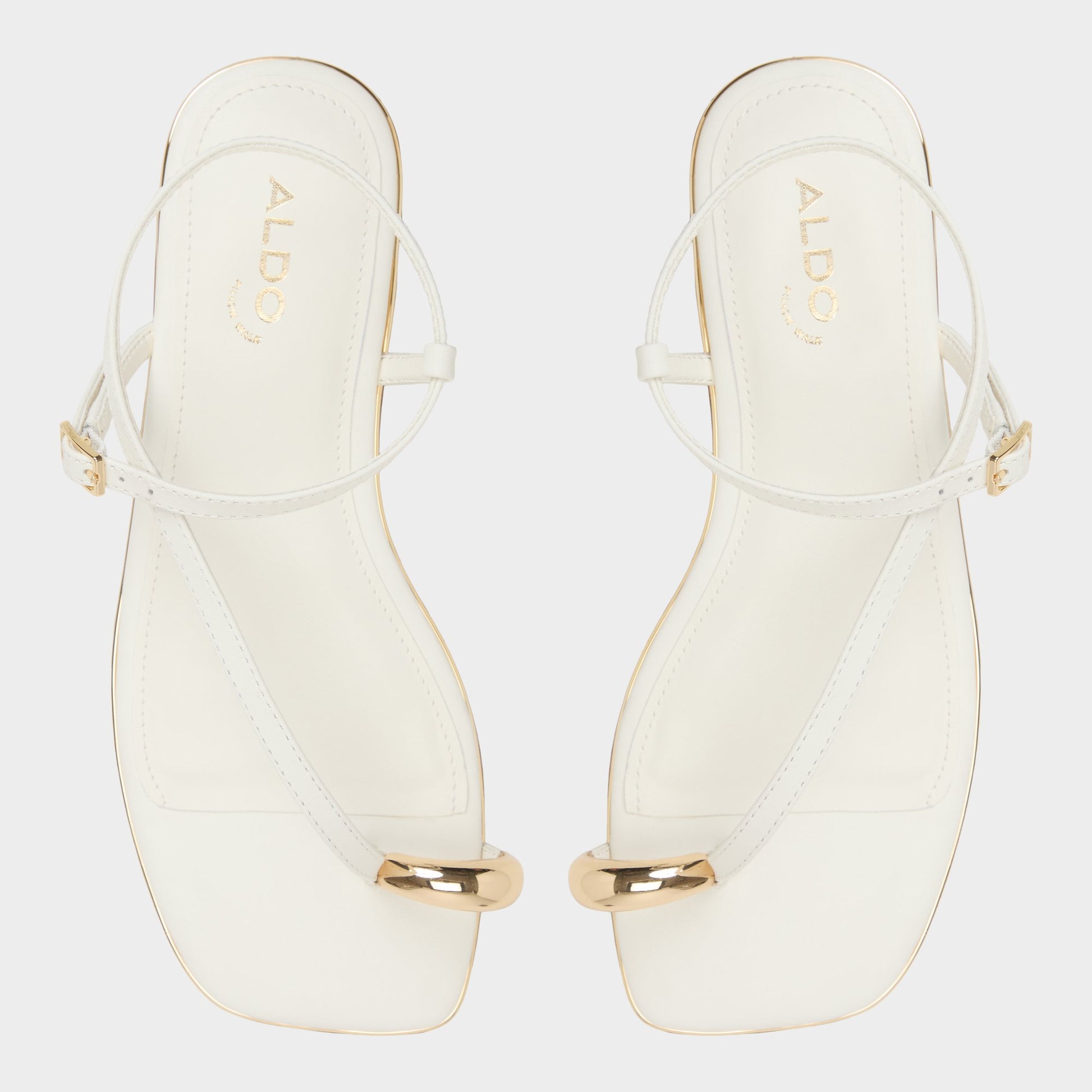Top-down view of the White Jomalina Strappy flat sandal