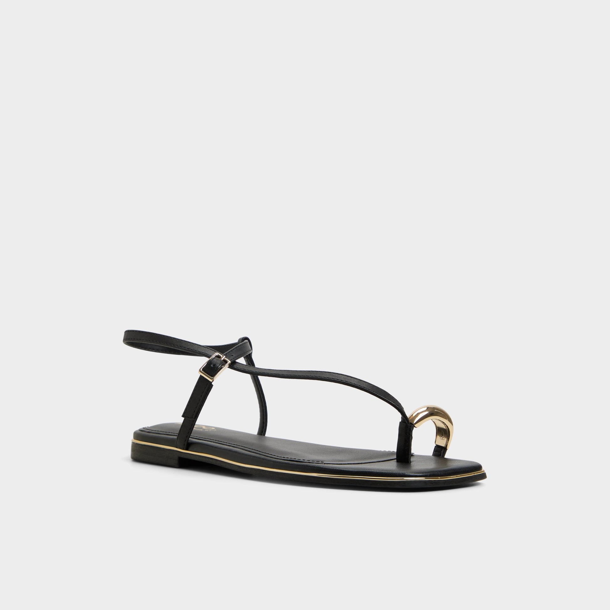 Three-quarter angle of Black Jomalina Strappy flat sandal's front side