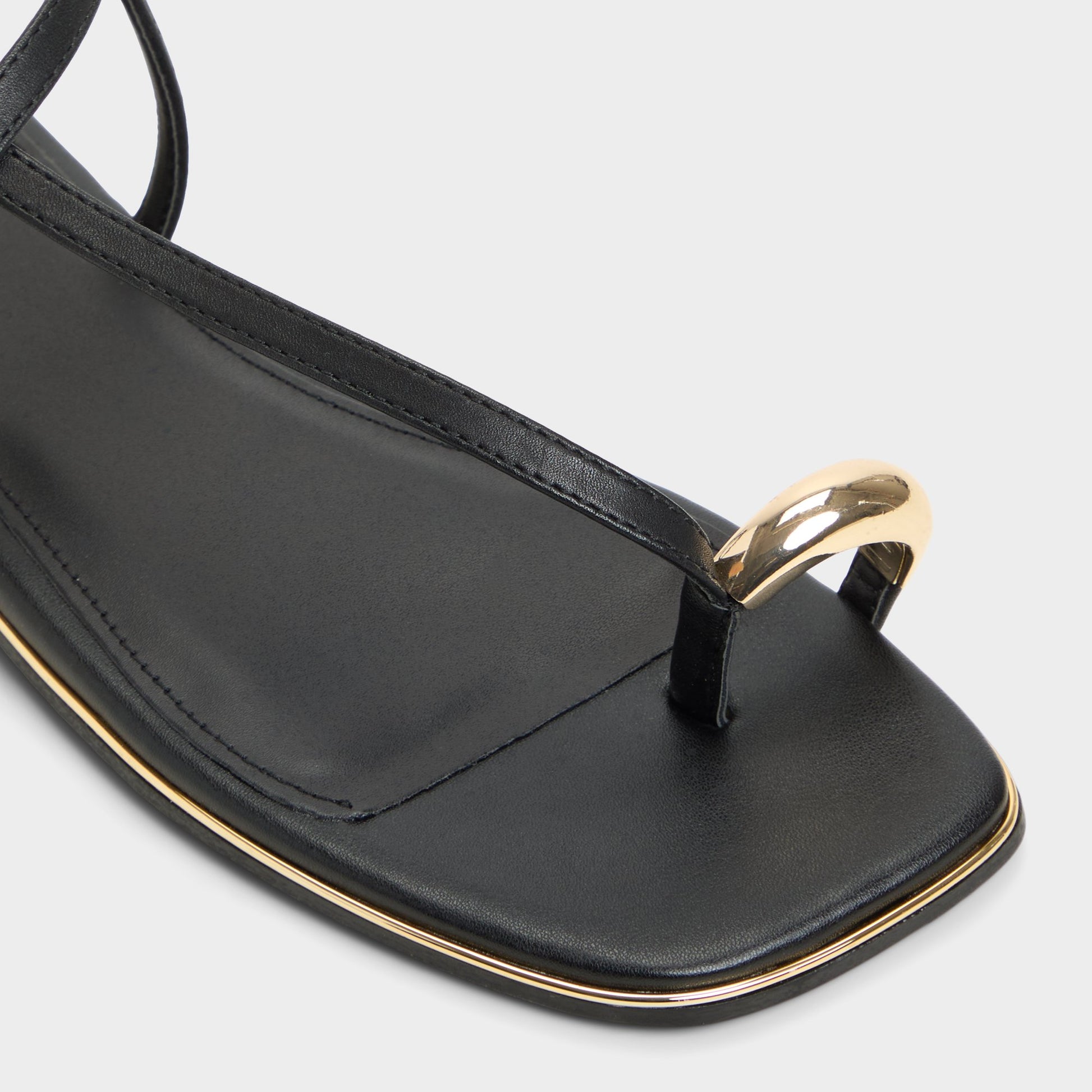 Close-up of the Black Jomalina Strappy flat sandal
