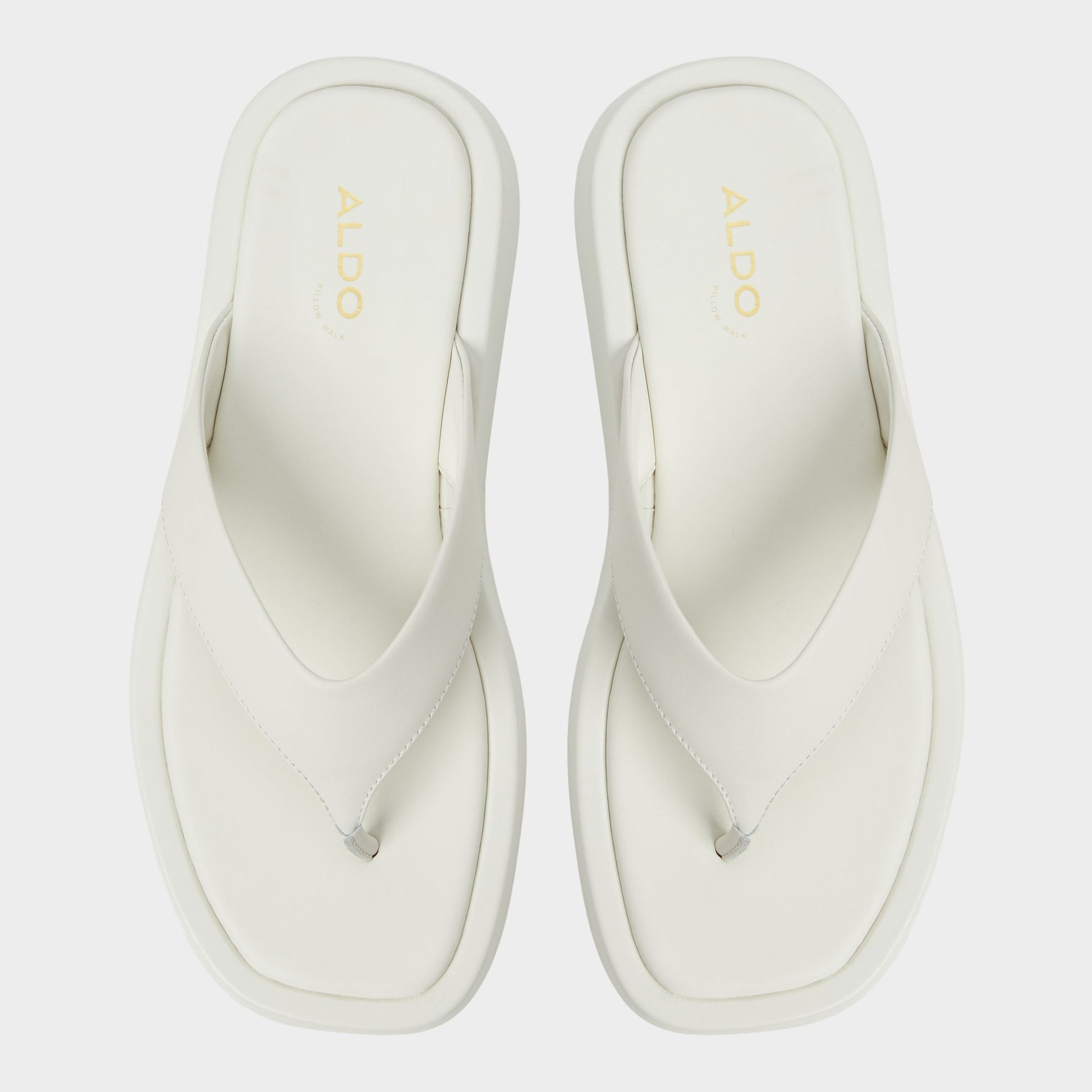 Top-down view of the White/Bone Grettle Flip flop