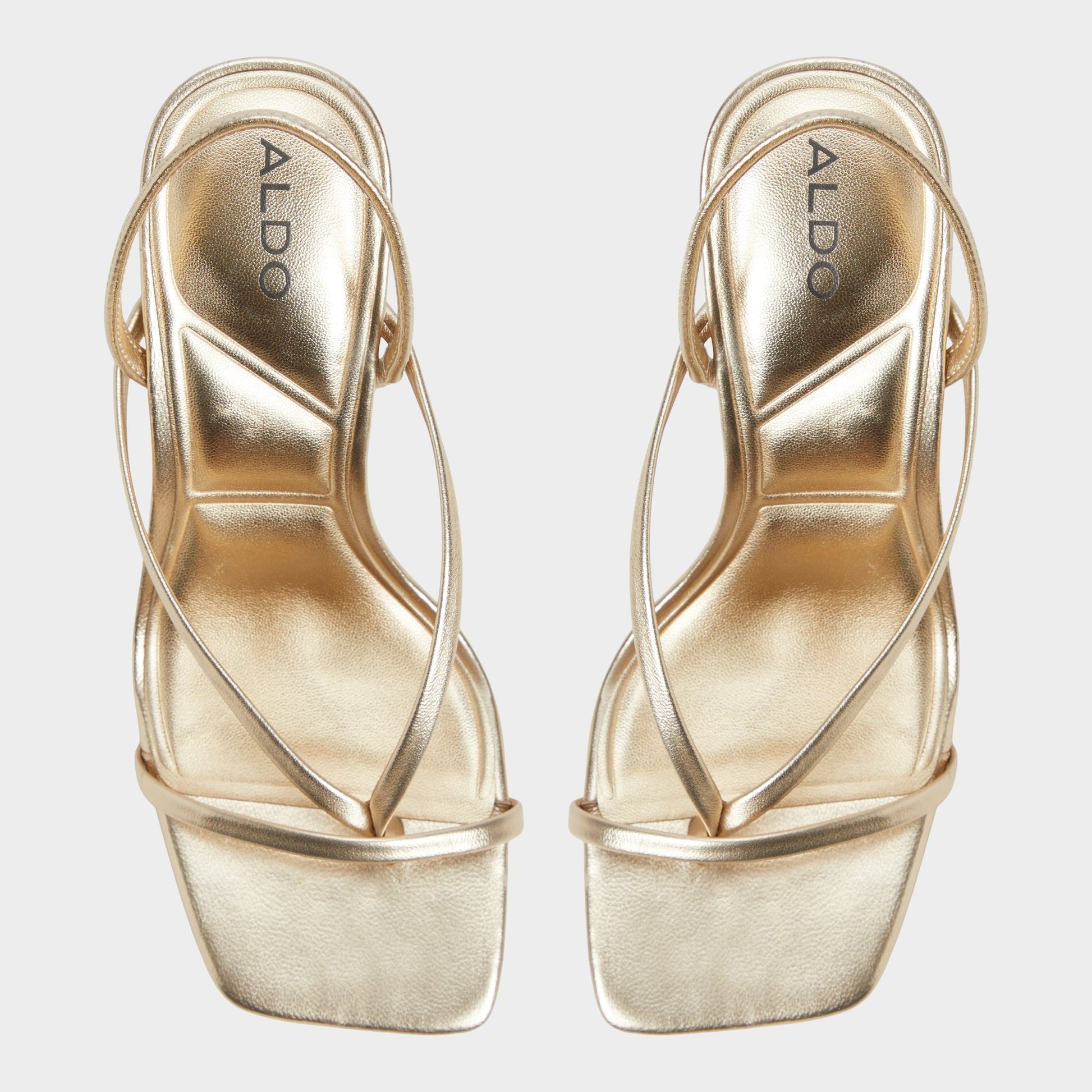 Top-down view of the Gold Riva Sling back heeled sandal
