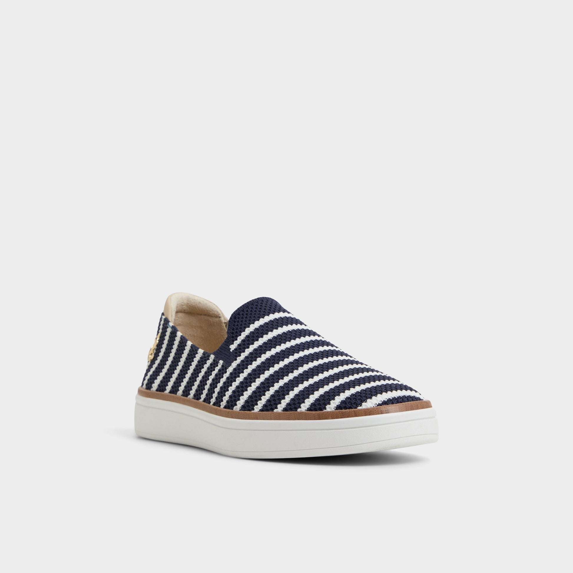 Three-quarter angle of Navy Allivian Slip-on sneaker's front side