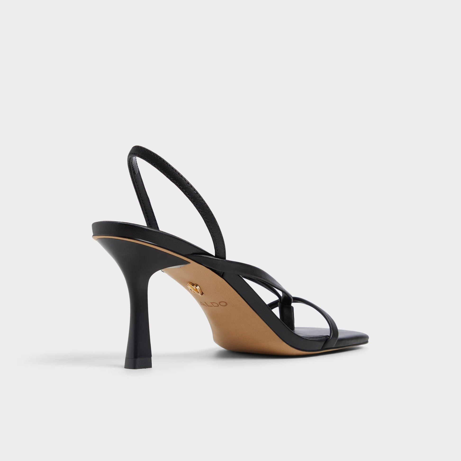 Three-quarter angle of Other Black Riva Sling back heeled sandal's back side